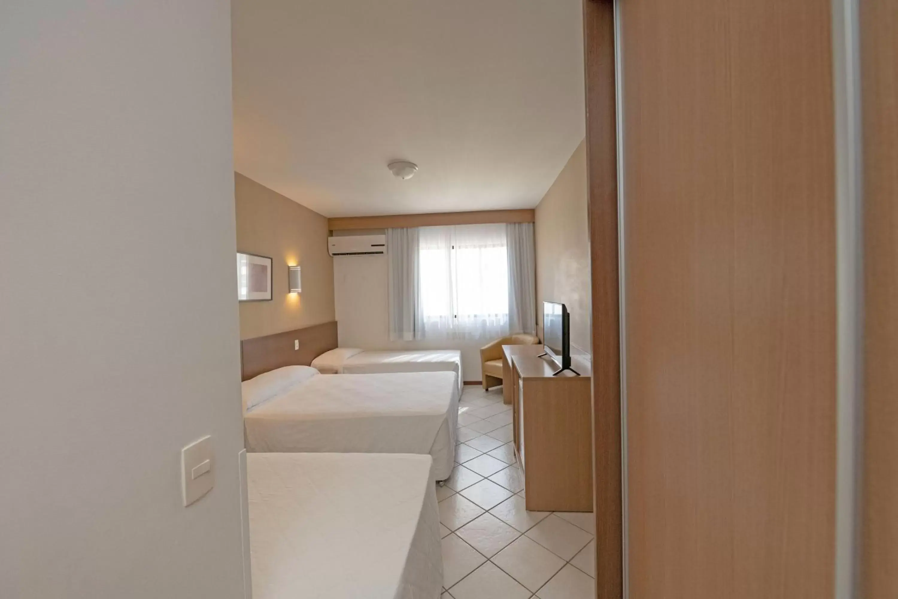 Bed, Bathroom in Atobá Praia Hotel