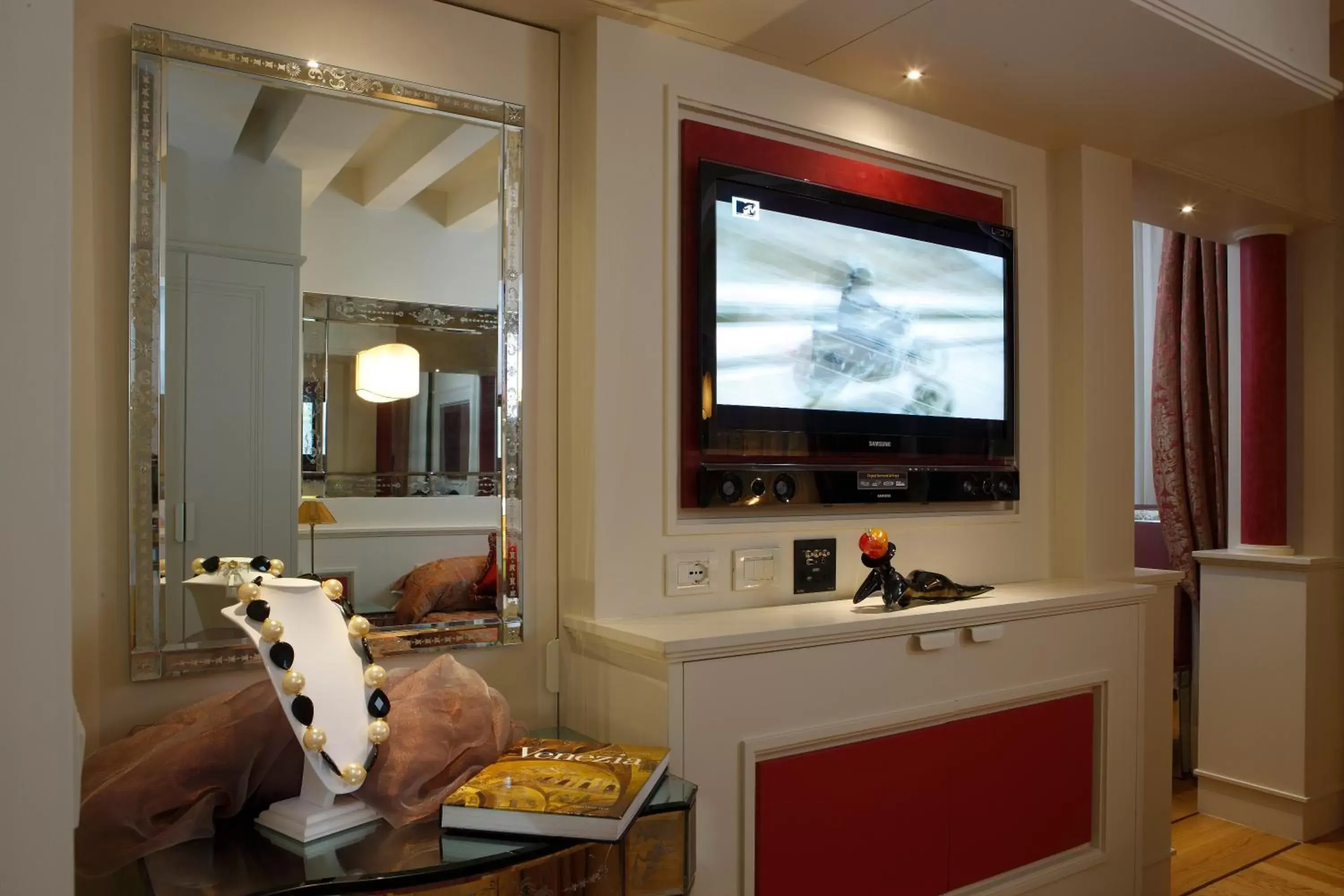 Decorative detail, TV/Entertainment Center in Canaletto Luxury Suites - San Marco Luxury