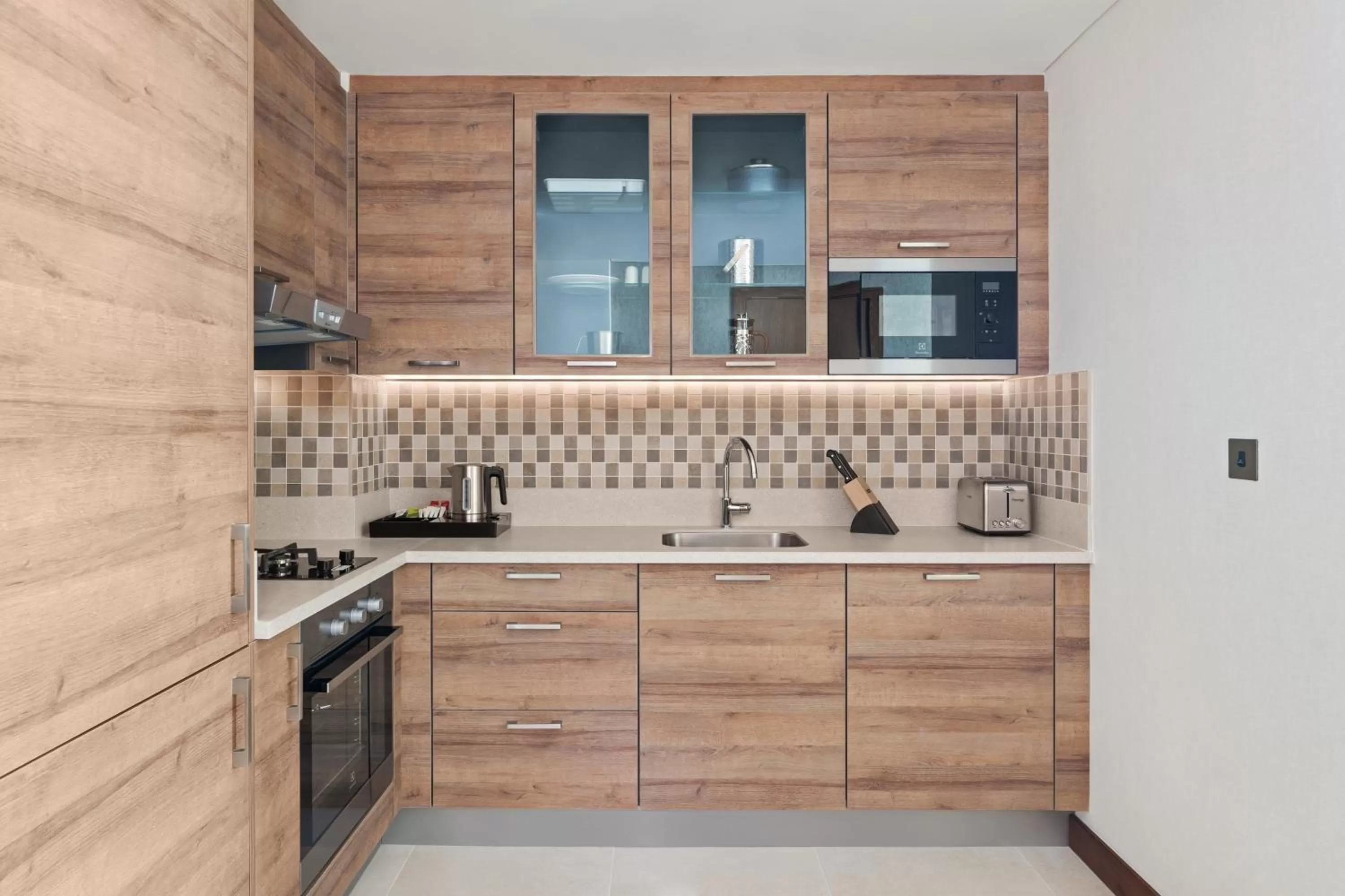 Lobby or reception in Staybridge Suites Dubai Al-Maktoum Airport by IHG