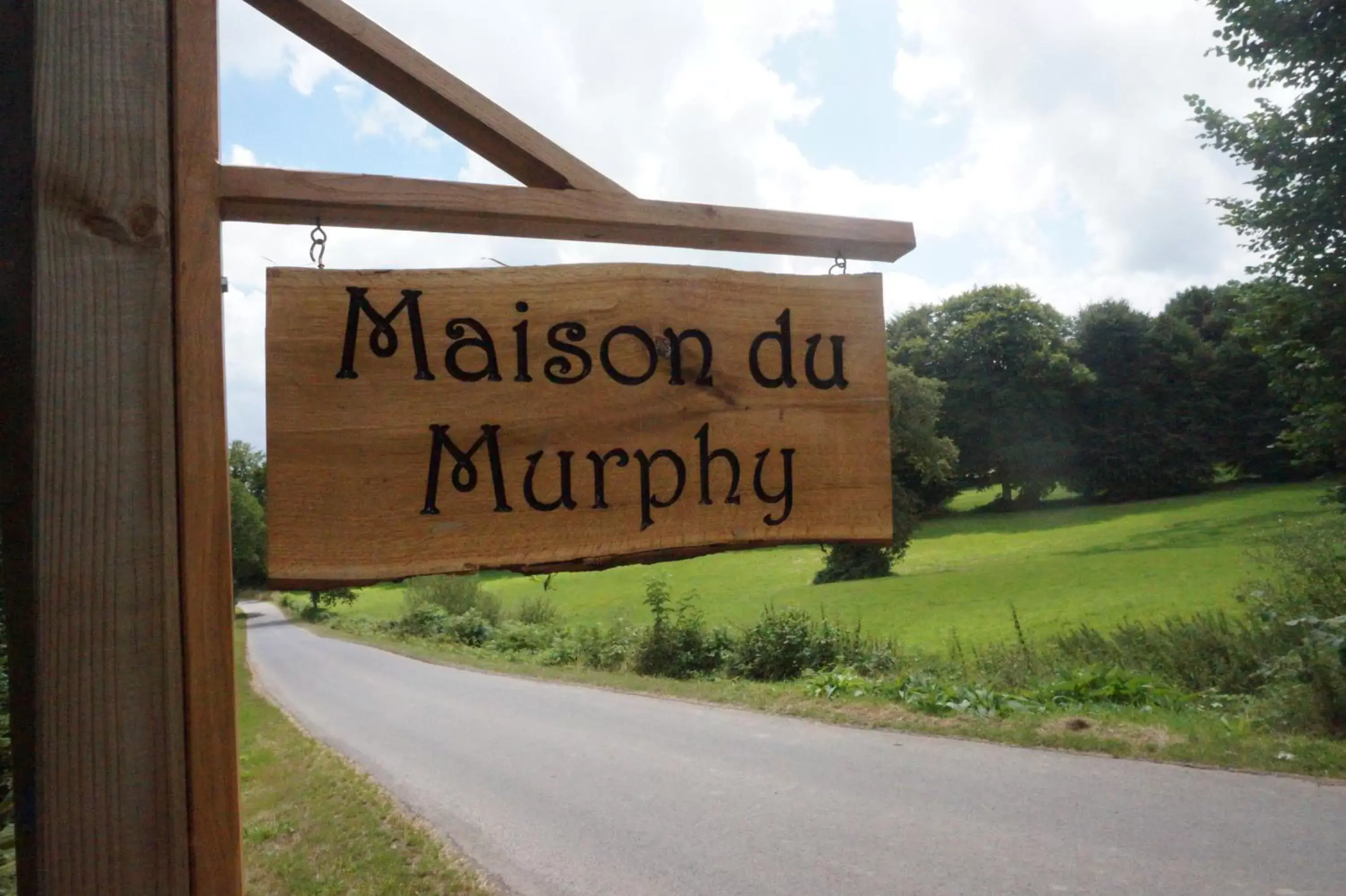 Property logo or sign in Maison du Murphy