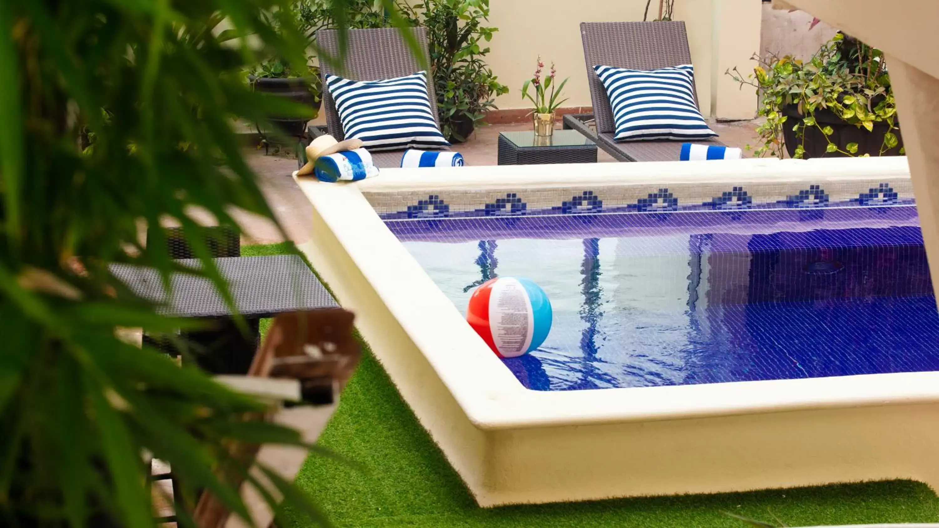 Swimming pool in Blue Chairs Resort by the Sea - Adults Only