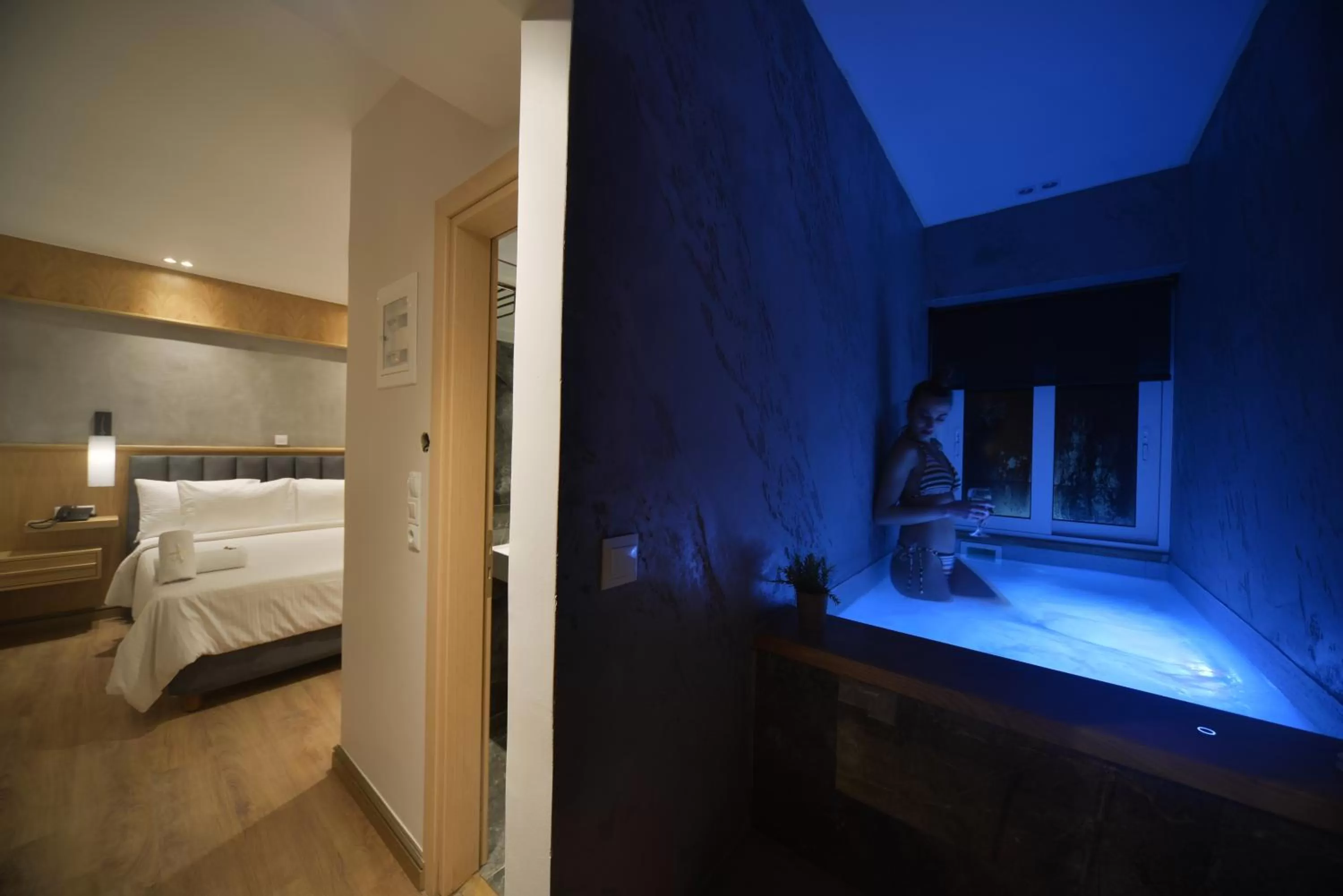 Hot Tub, Bed in Anixi Hotel by AP