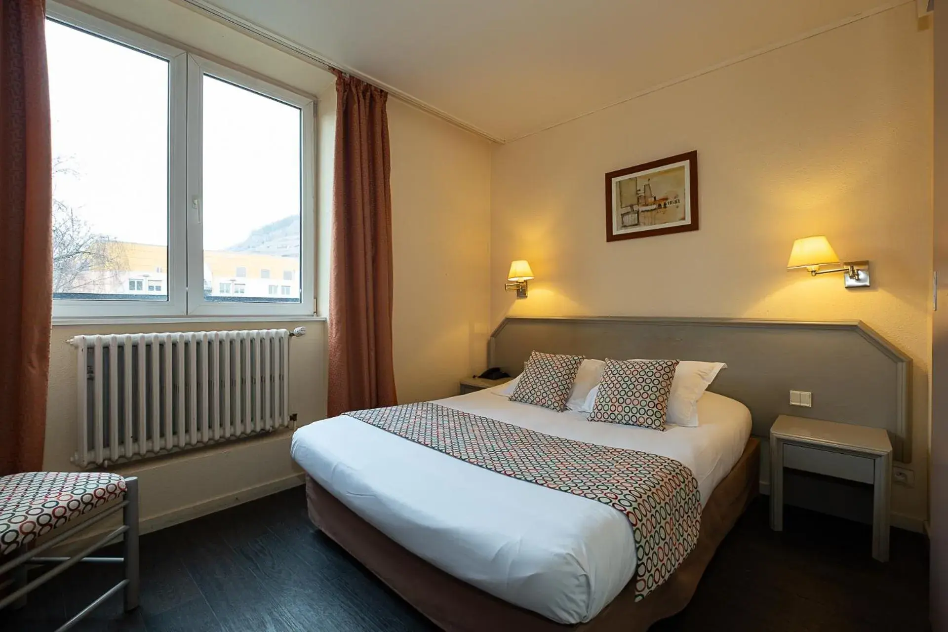 Bed in The Originals City Hotel de l Ange Guebwiller Bed in The Originals City Hotel de l Ange Guebwiller