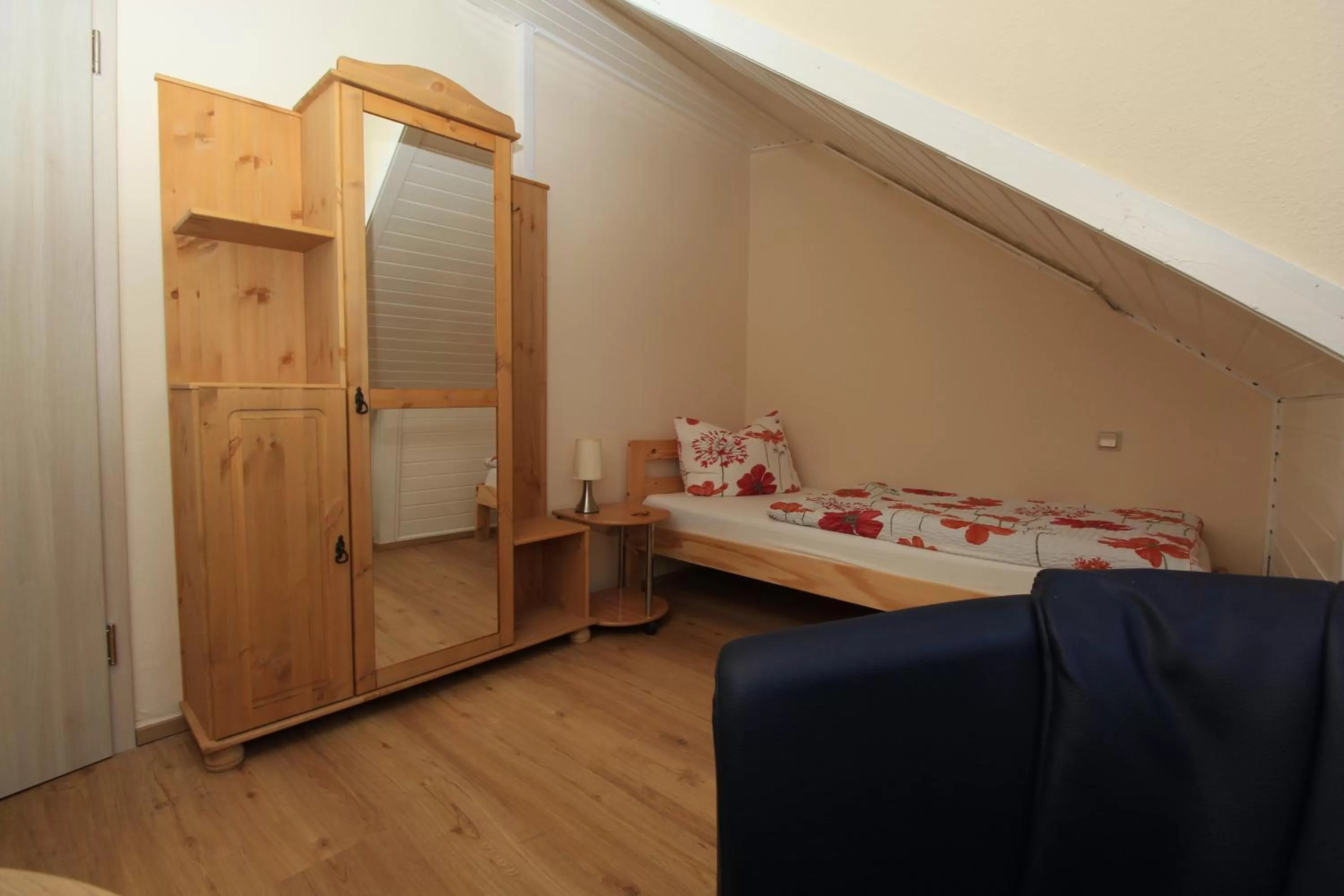 Bed in Waldhotel Albachmühle mit Albacher Stuben