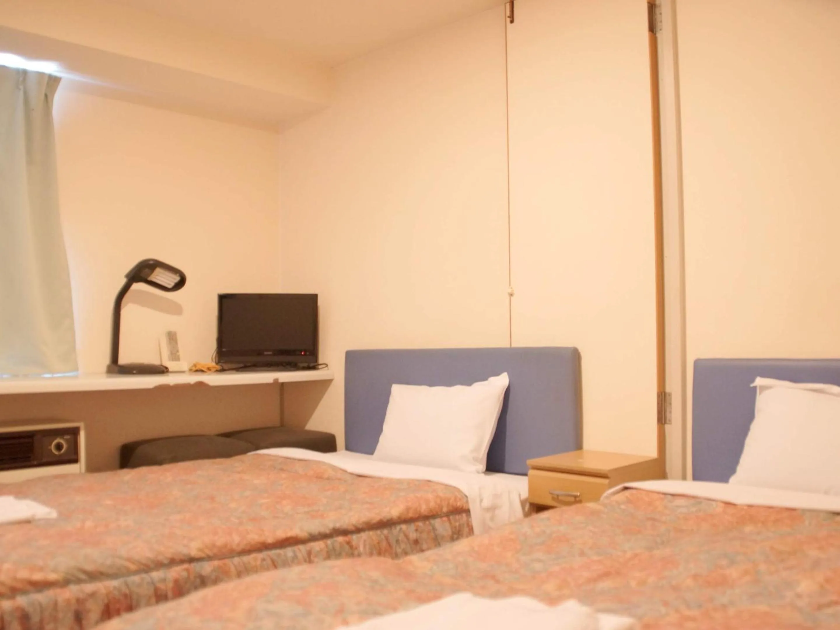 Photo of the whole room, Bed in Business Hotel Chateau Est Takamatsu