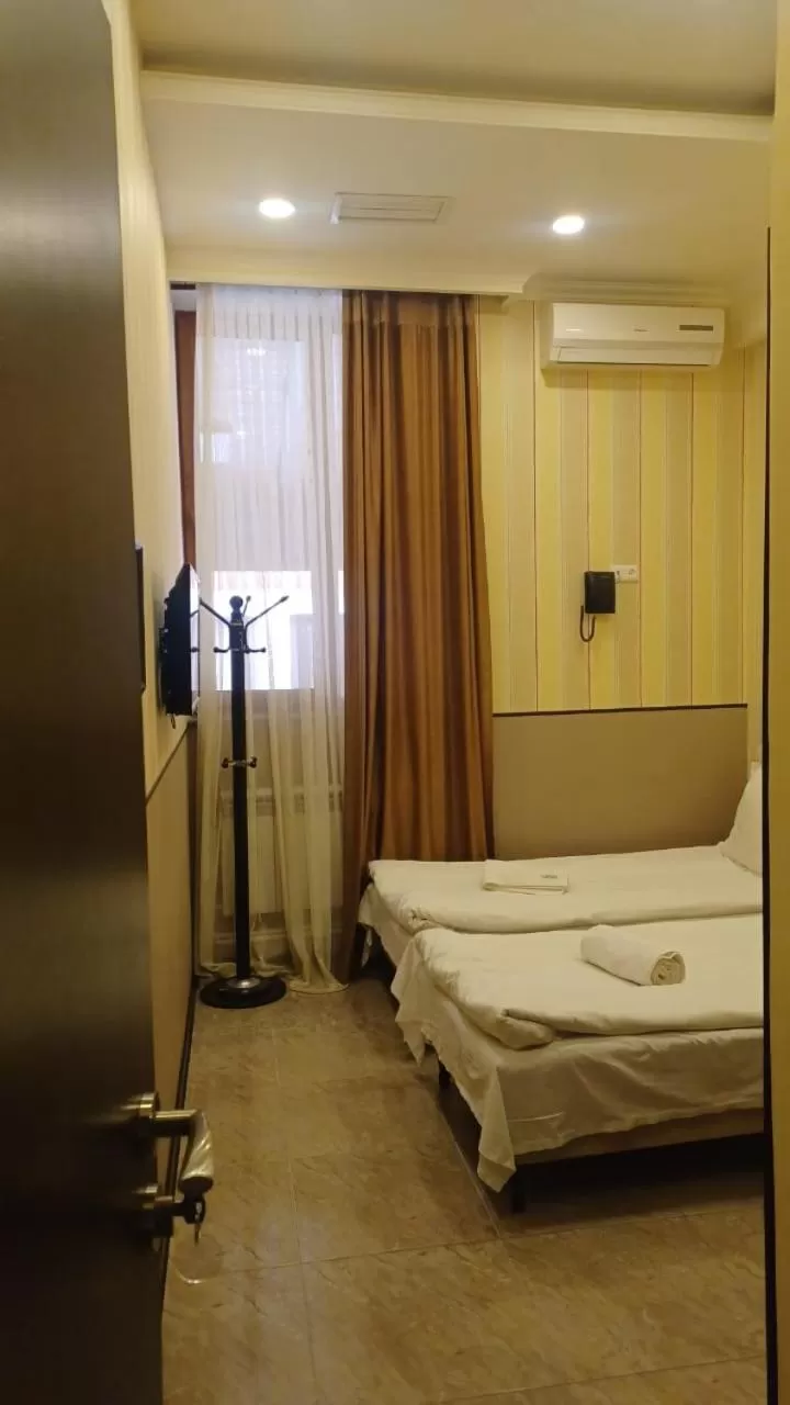 Bed in Eridana Hotel