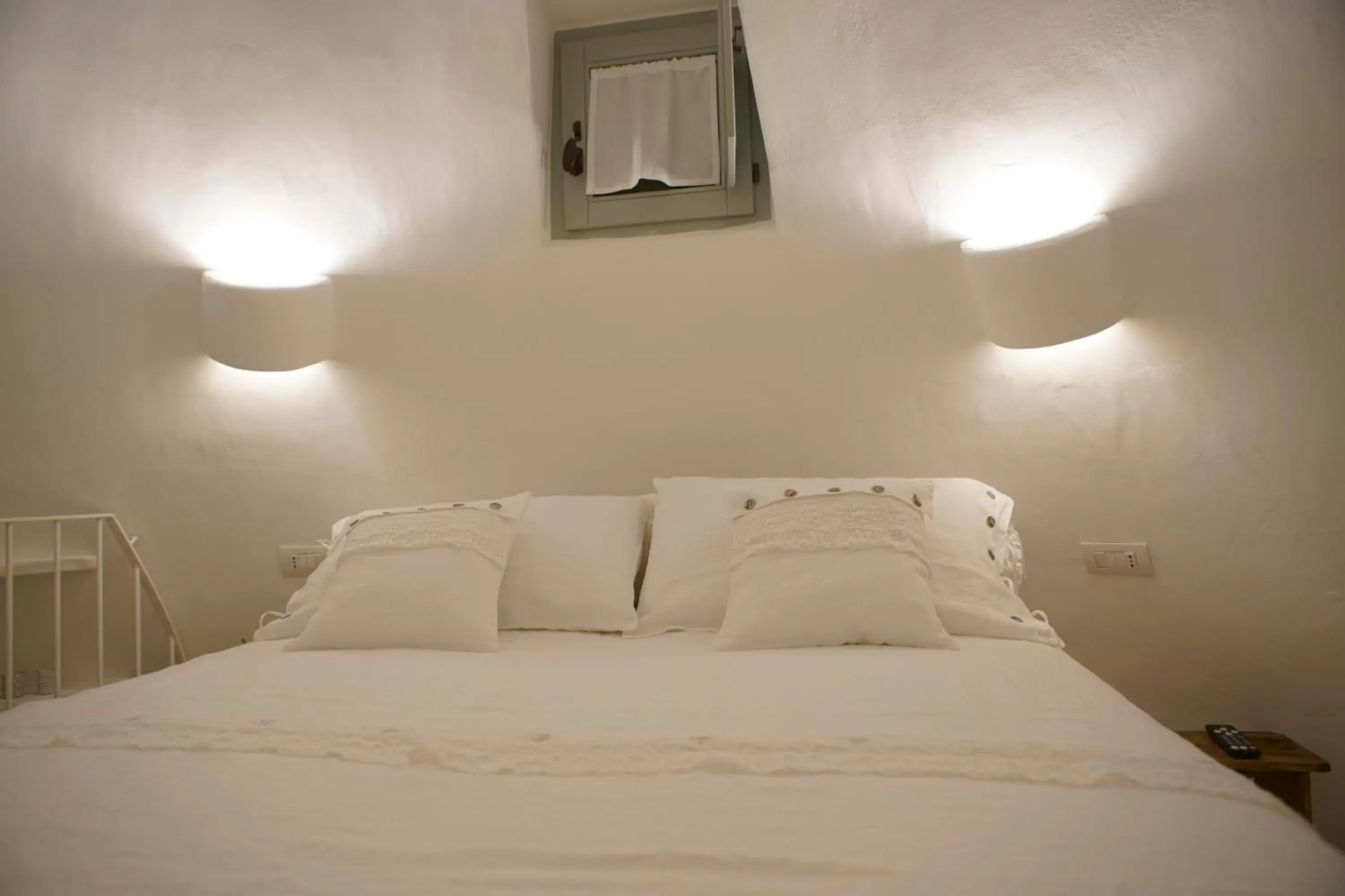 Bed in Trullo Essenza-Trulli Antì Charme & Relax