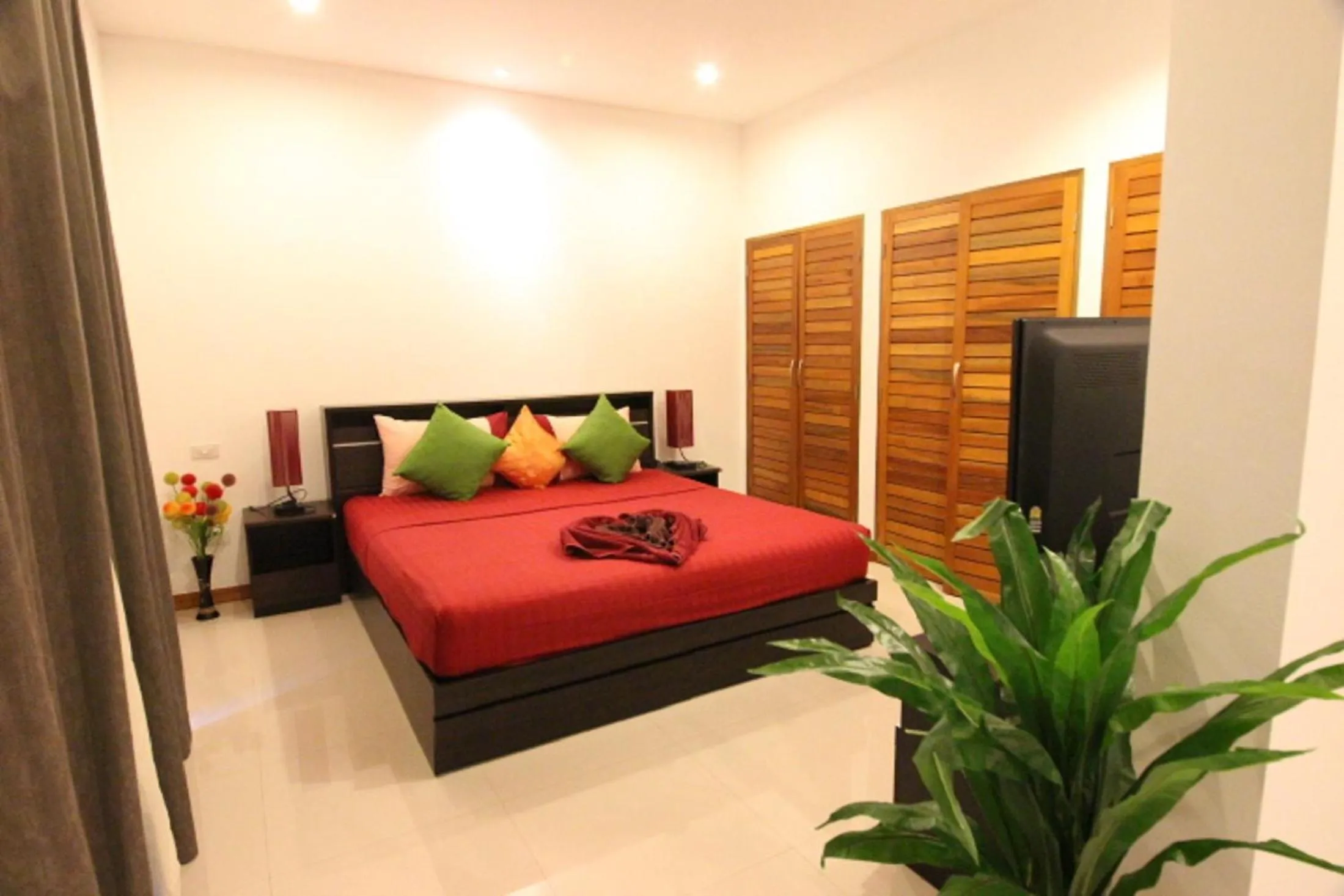 Bed in Tropical Sea View Residence