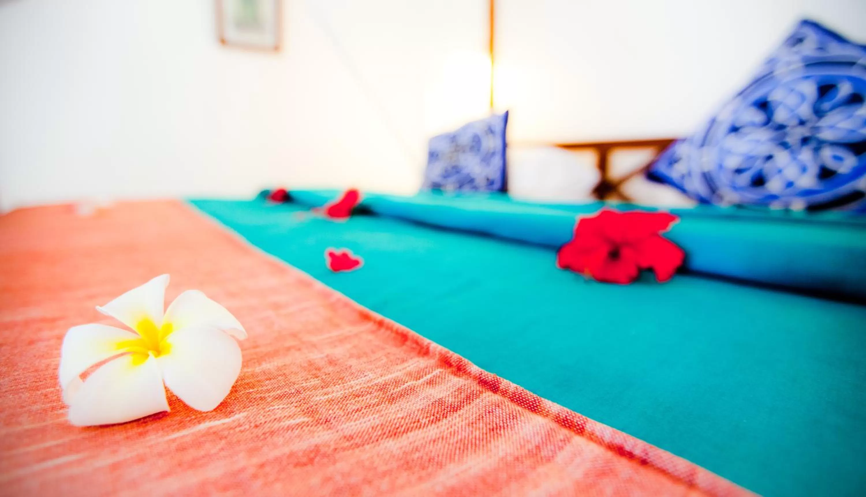Bed in Flame Tree Cottages