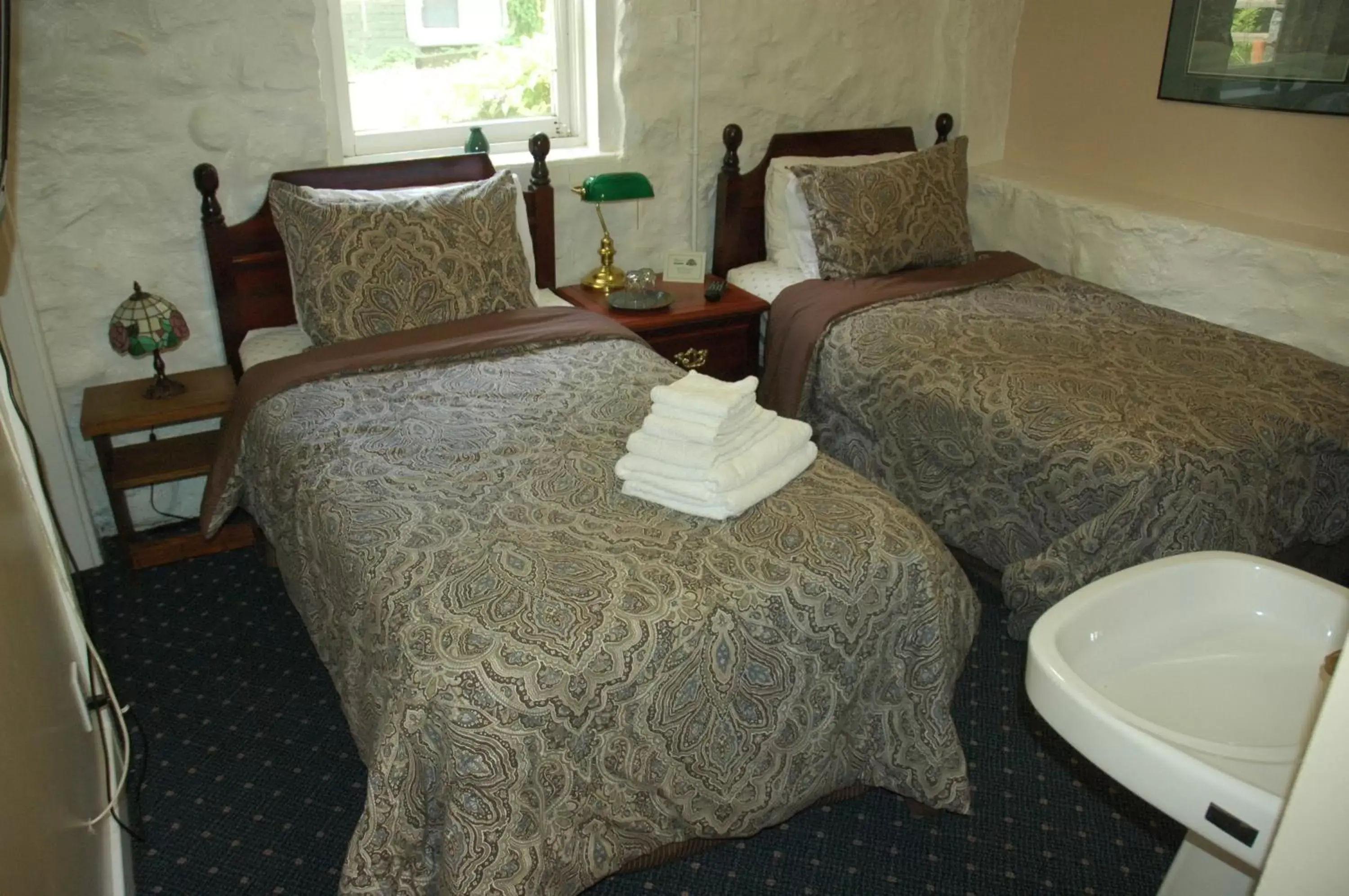 Bed in Windsor Guest House