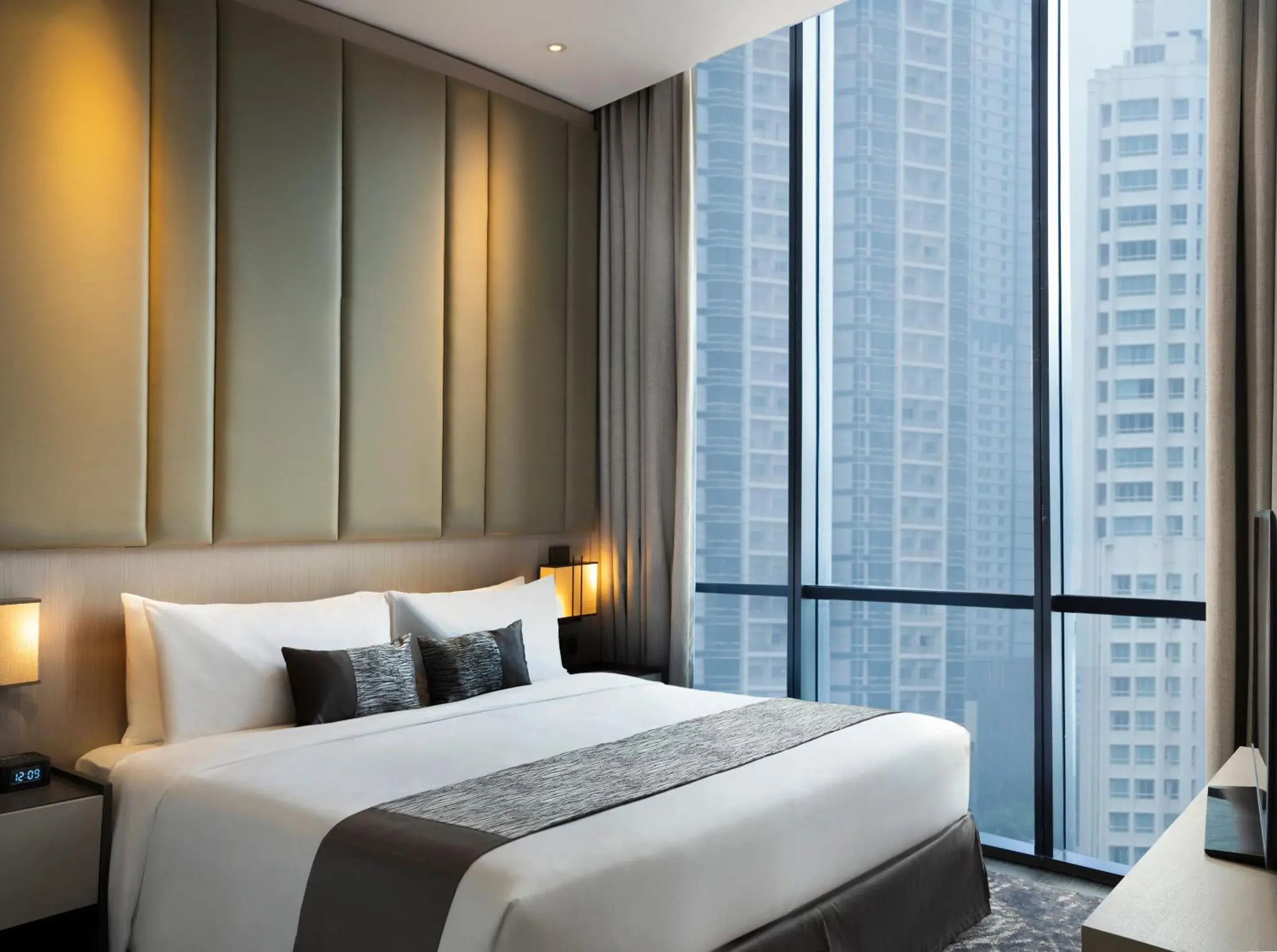 Bed in Crowne Plaza Jakarta Residences, an IHG Hotel Bed in Crowne Plaza Jakarta Residences, an IHG Hotel