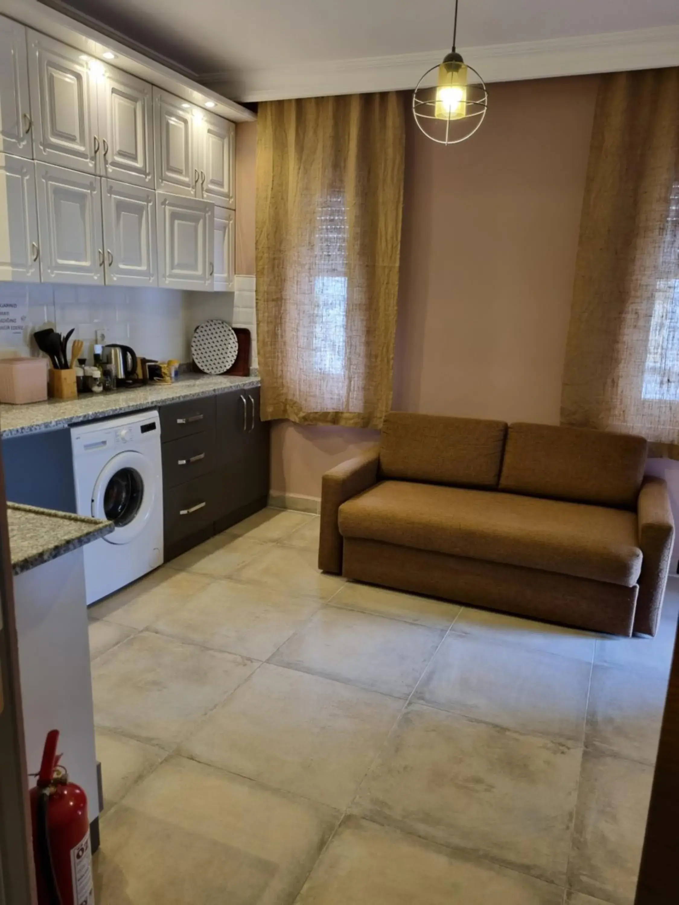 Kitchen/Kitchenette in El Mundo Suites