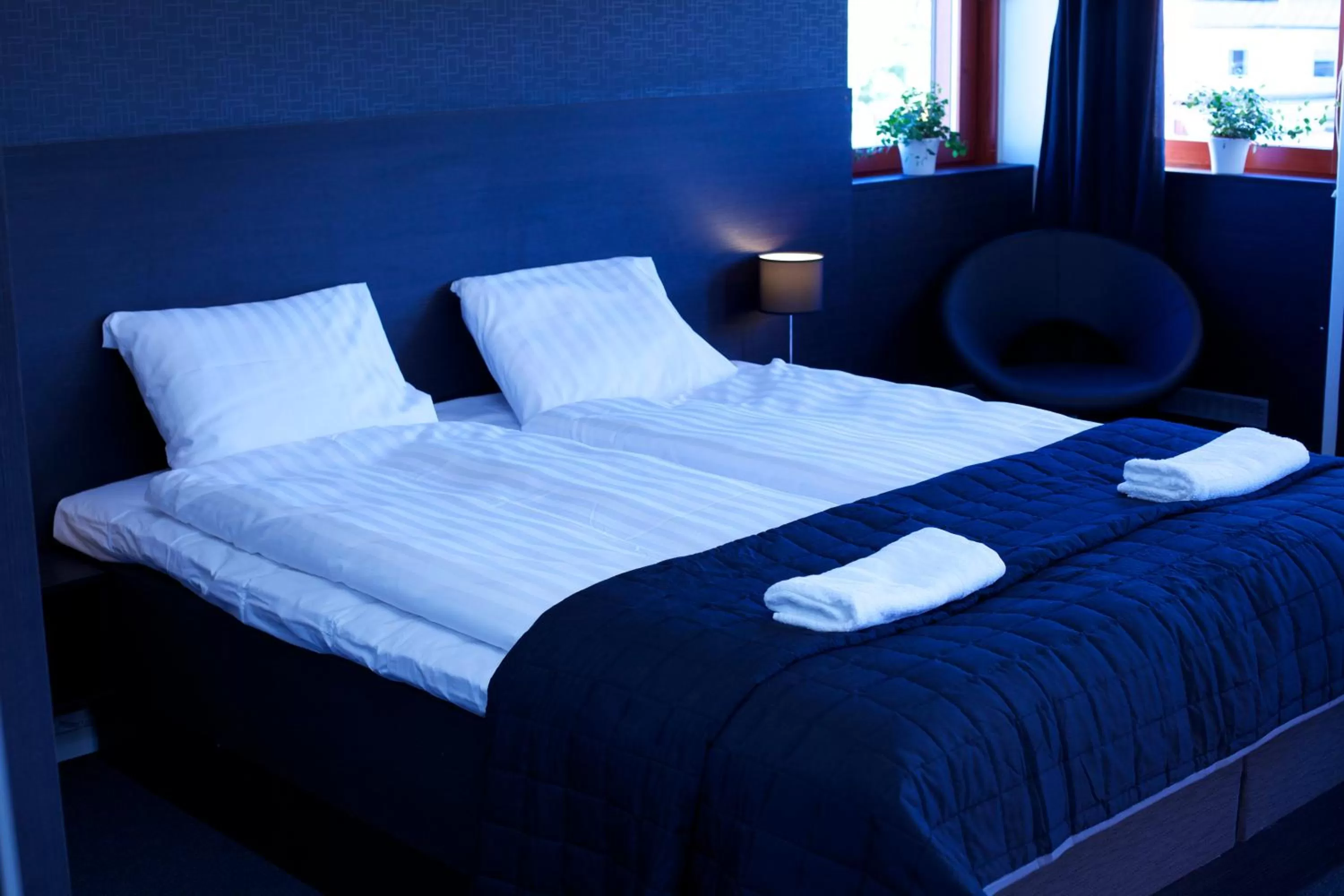 Photo of the whole room, Bed in Nacka Stadshotell