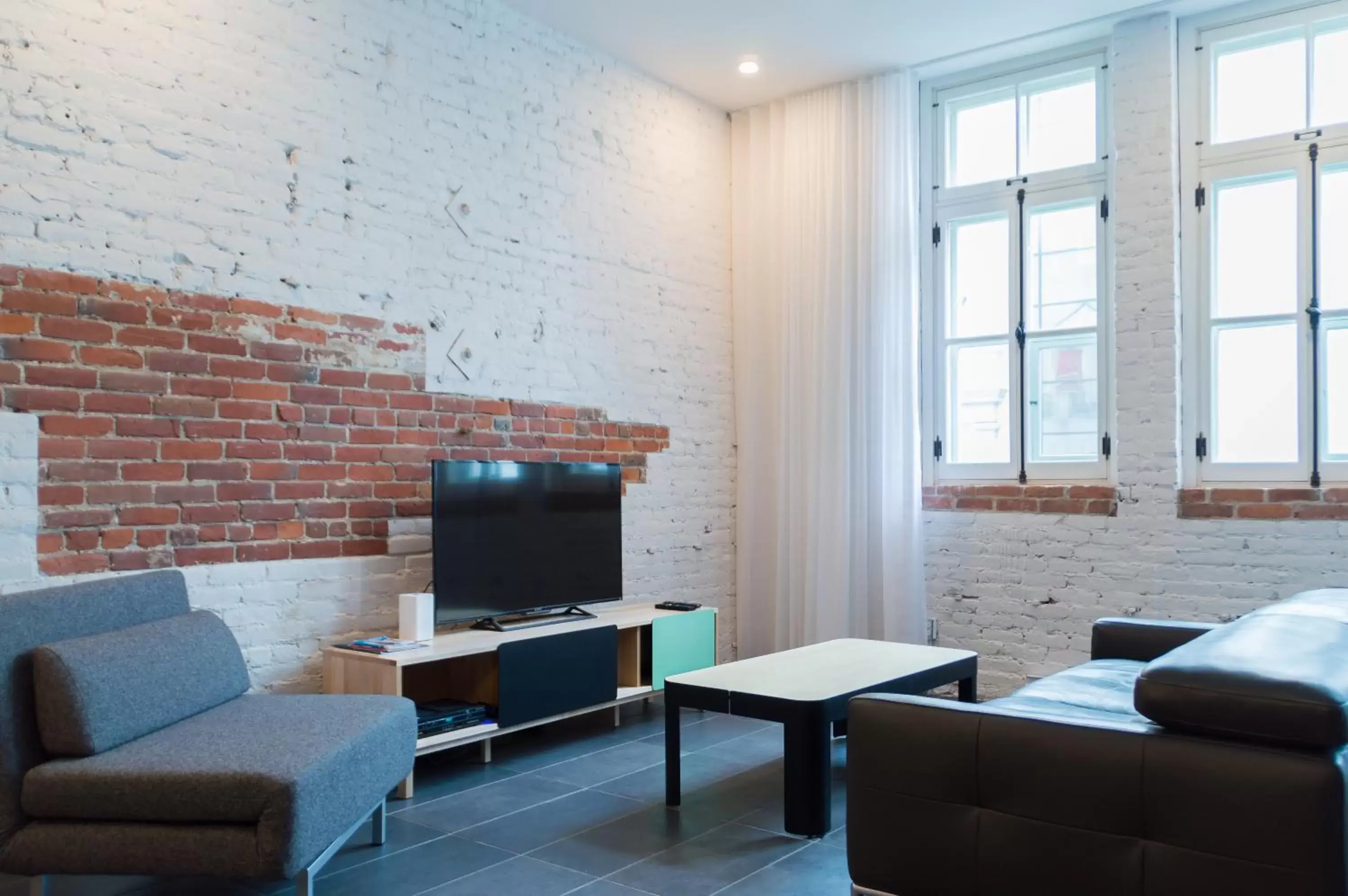 Communal lounge/ TV room, Seating Area in Les Lofts de la Barricade - Par les Lofts Vieux-Québec