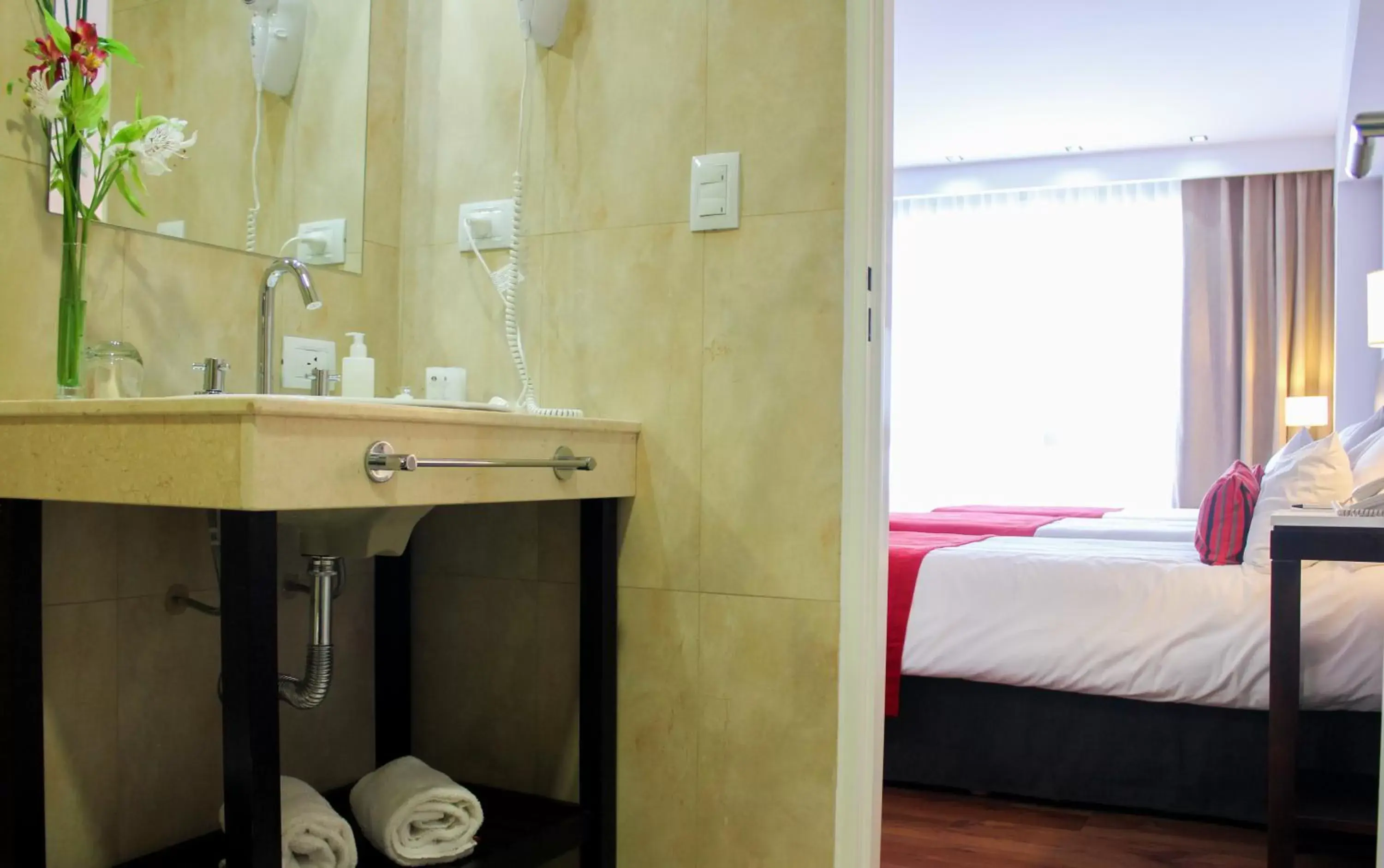 Bed, Bathroom in Dazzler by Wyndham Puerto Madryn