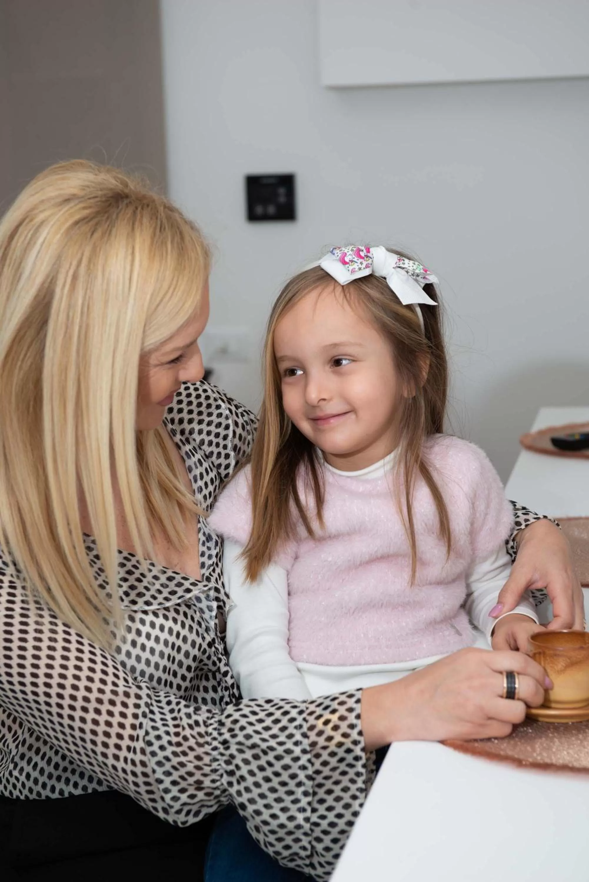 Family in Blanc Rooms