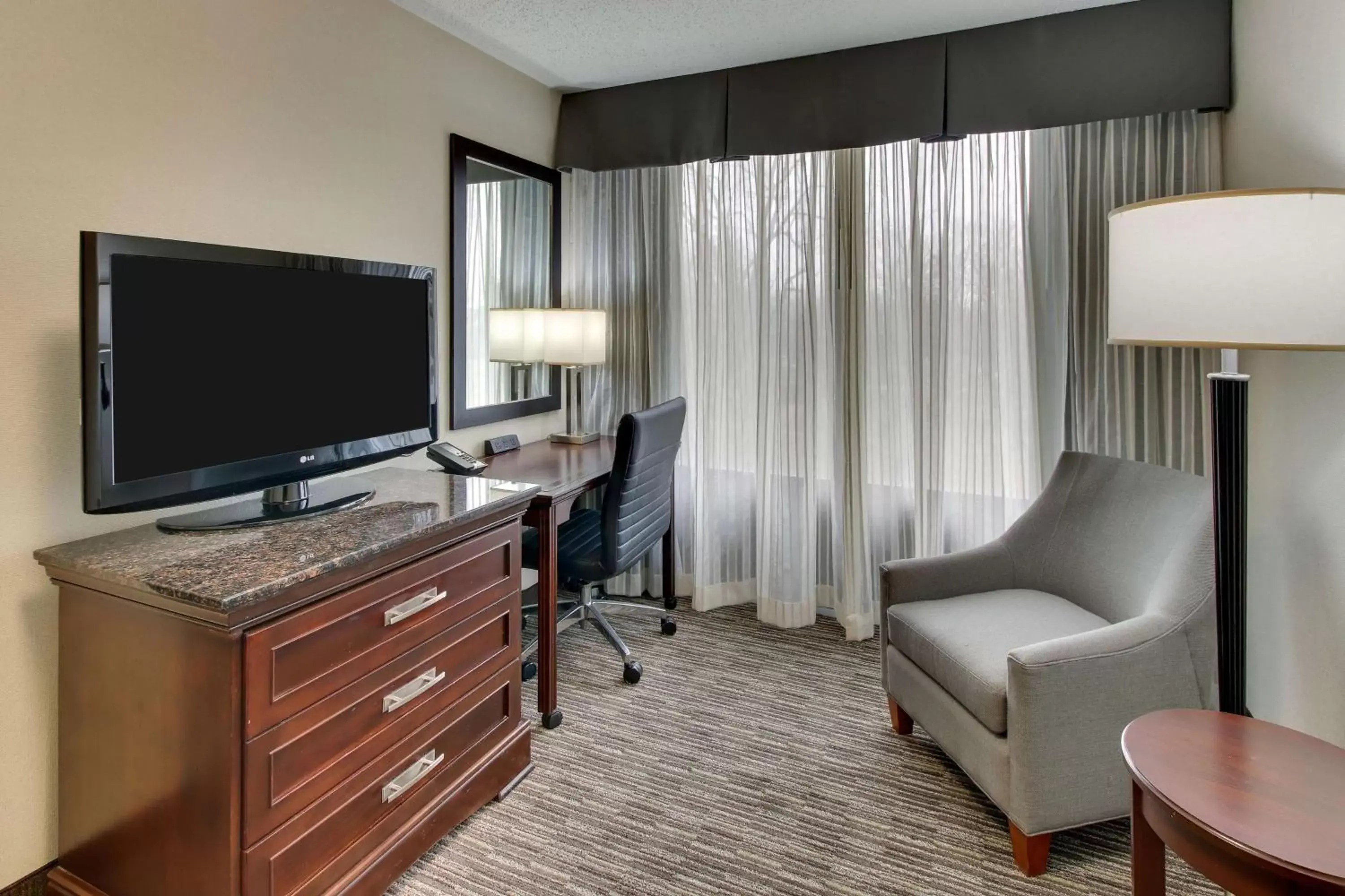 Photo of the whole room, TV/Entertainment Center in Best Western Plus Indianapolis North at Pyramids