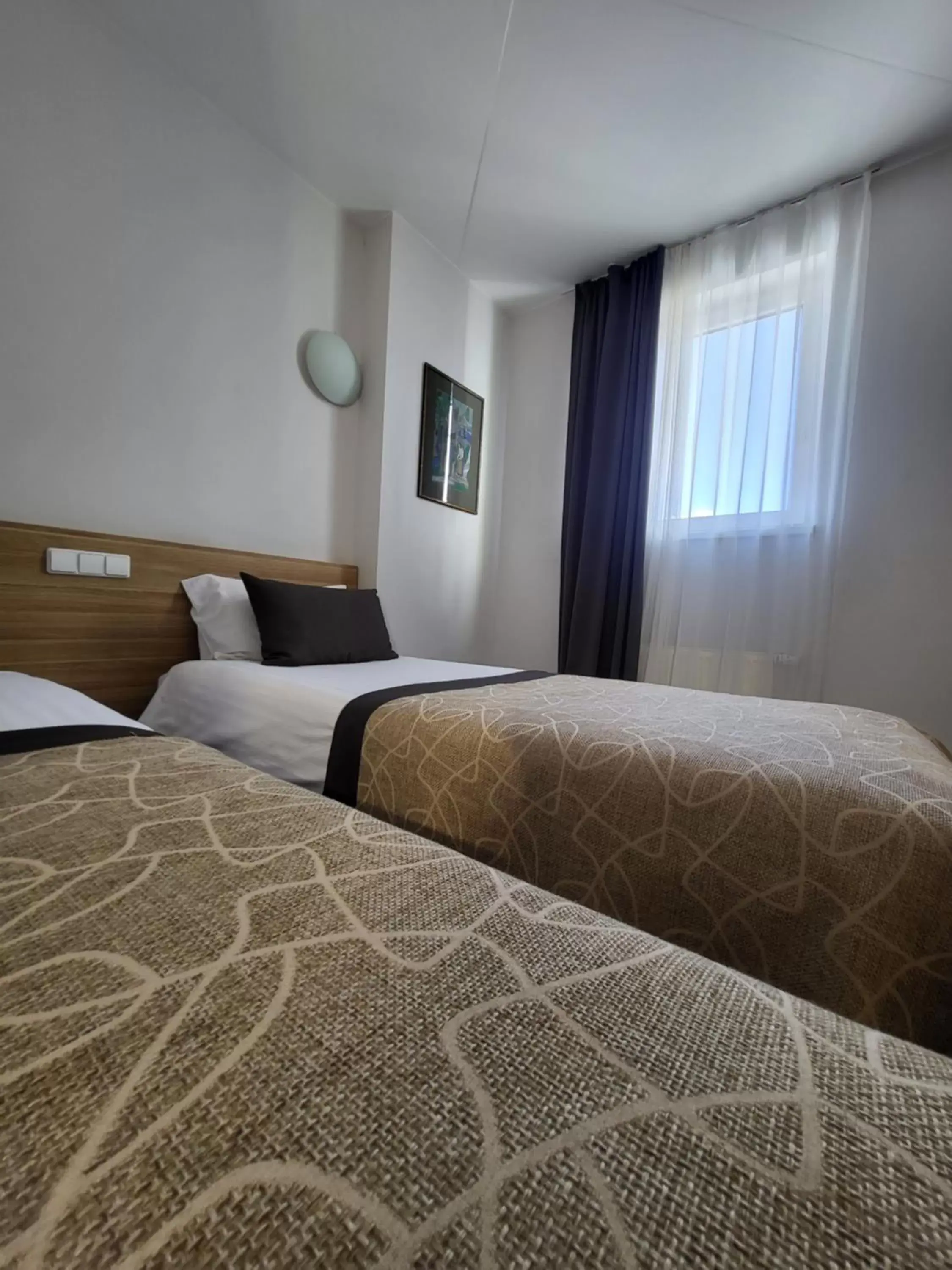 Bed in Green Vilnius Hotel