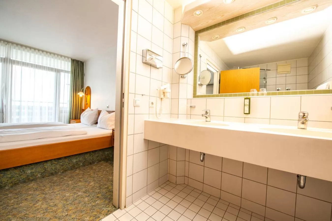Bathroom, Bed in feelMOOR - Gesundresort Bad Wurzach