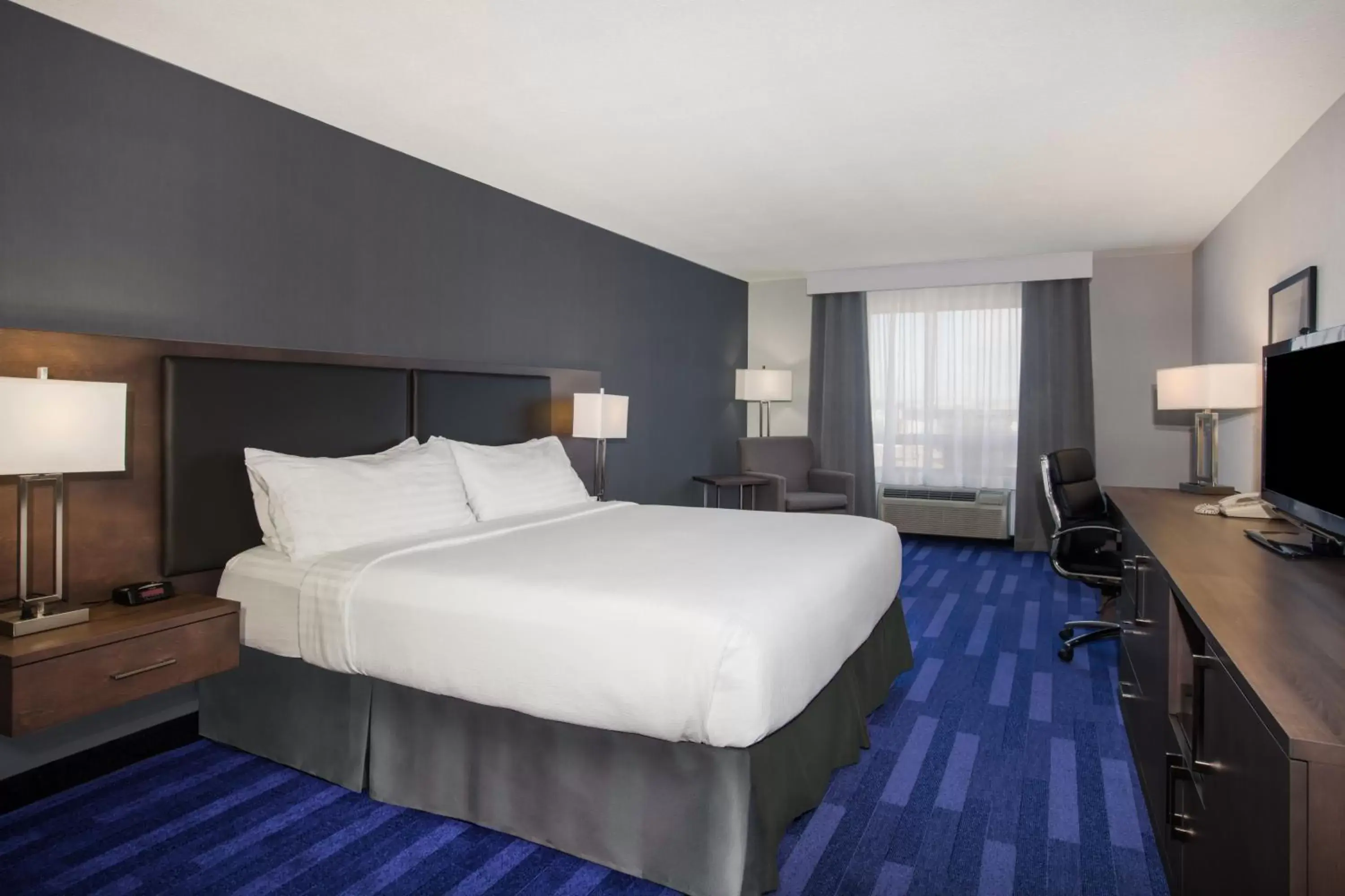 Photo of the whole room, Bed in Holiday Inn & Suites Grande Prairie, an IHG Hotel