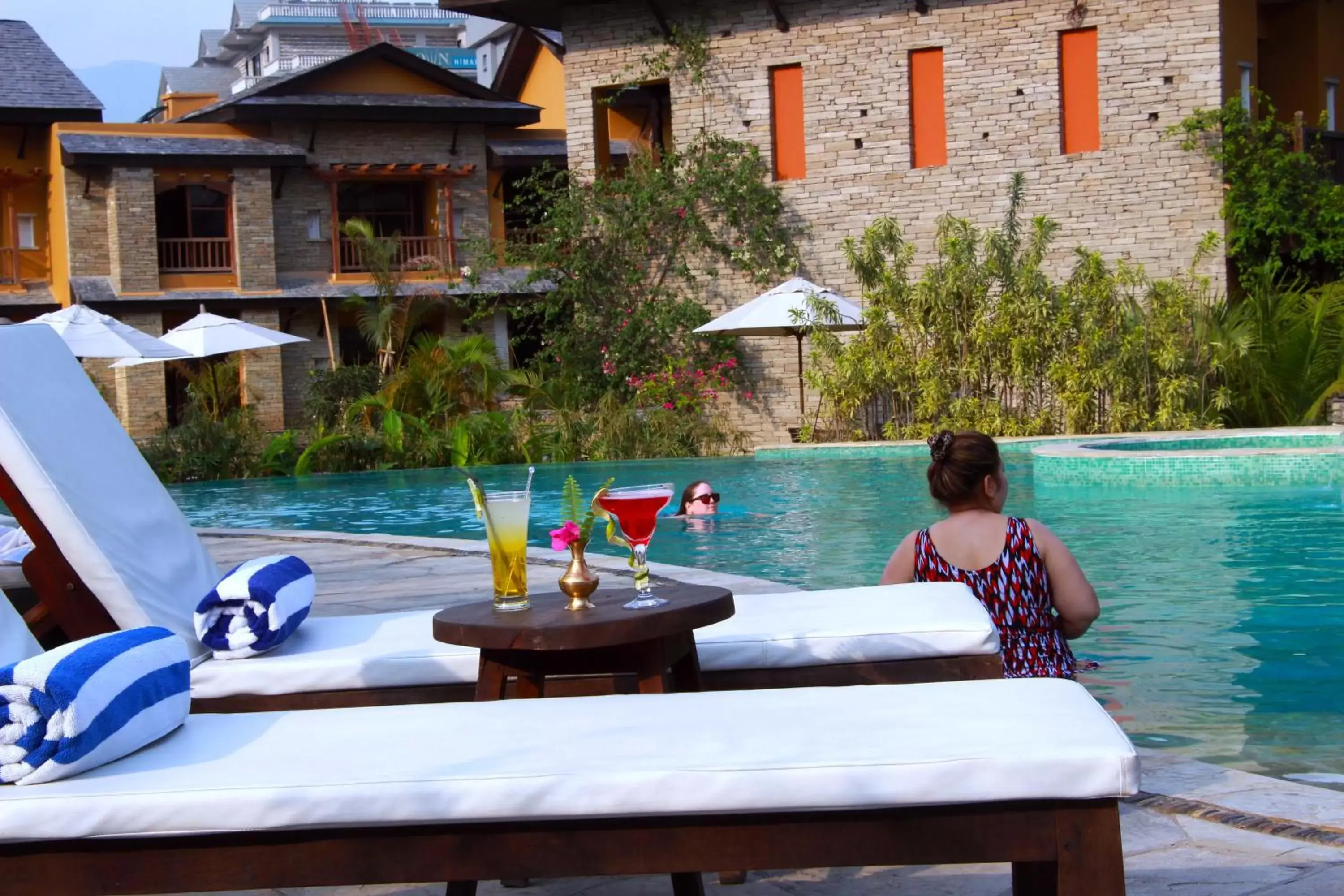 People, Swimming Pool in Temple Tree Resort & Spa