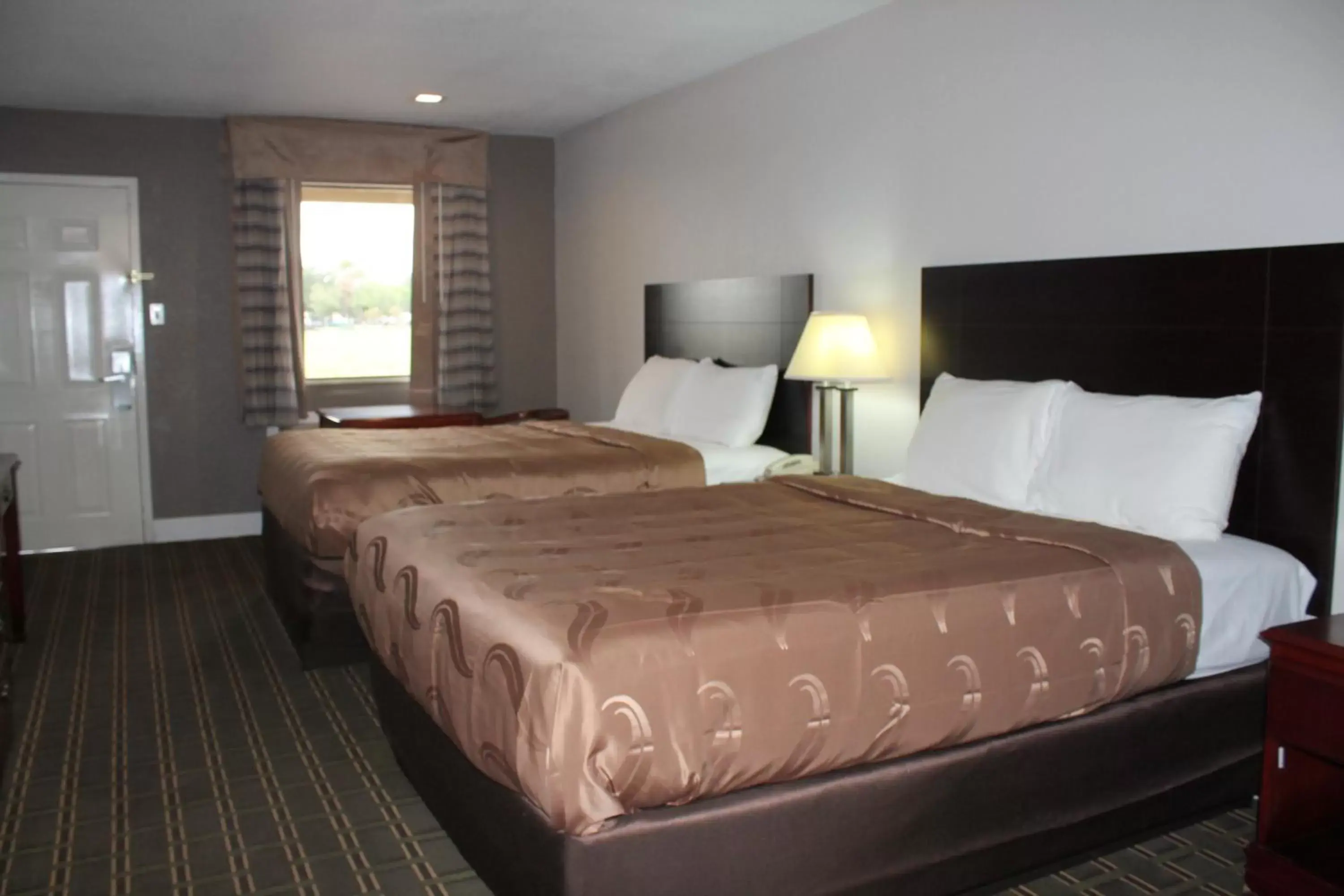 Bed in Quality Inn & Suites Port Arthur - Nederland