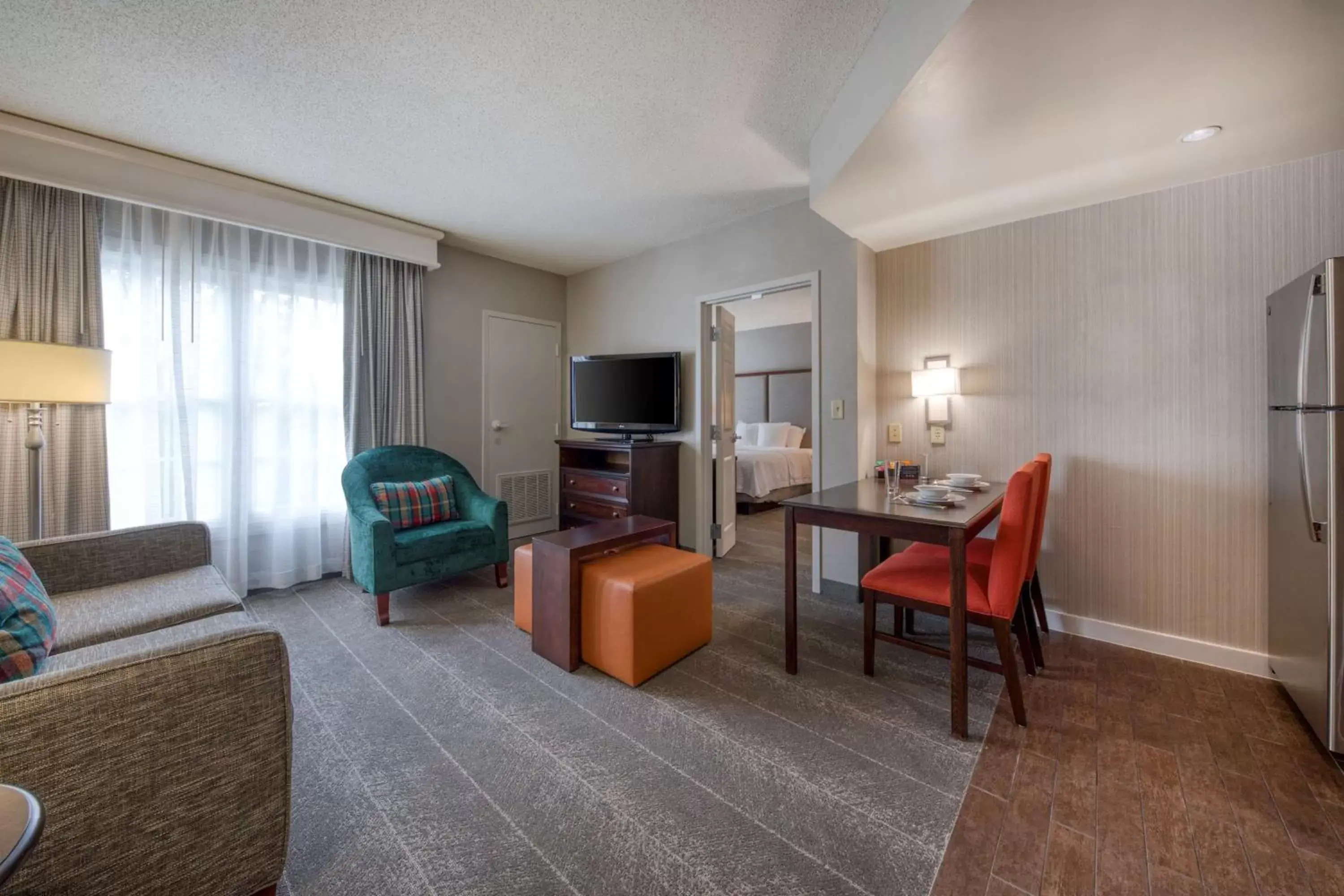 Living room, TV/Entertainment Center in Homewood Suites by Hilton Olmsted Village