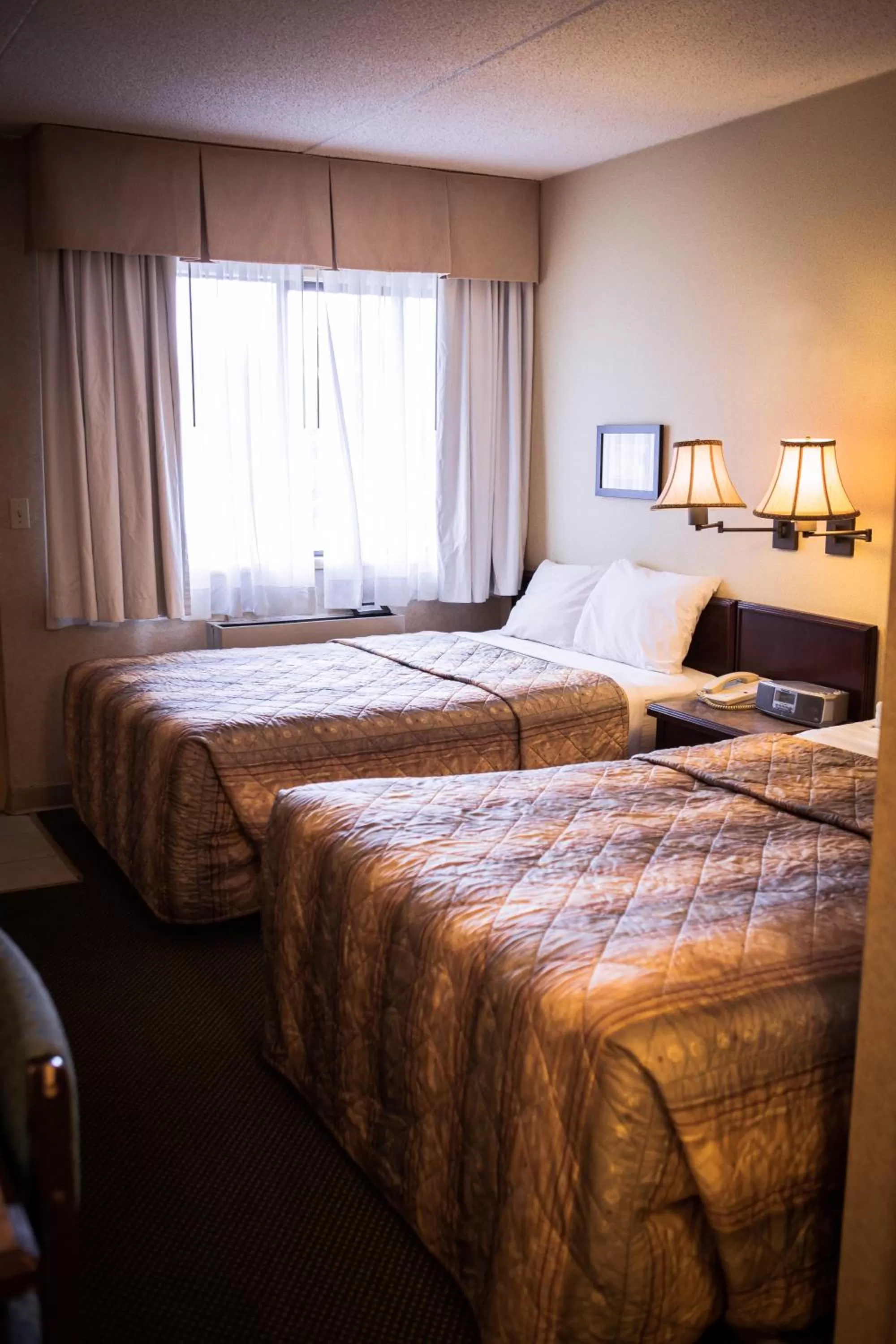 Photo of the whole room, Bed in Langley Hwy Hotel