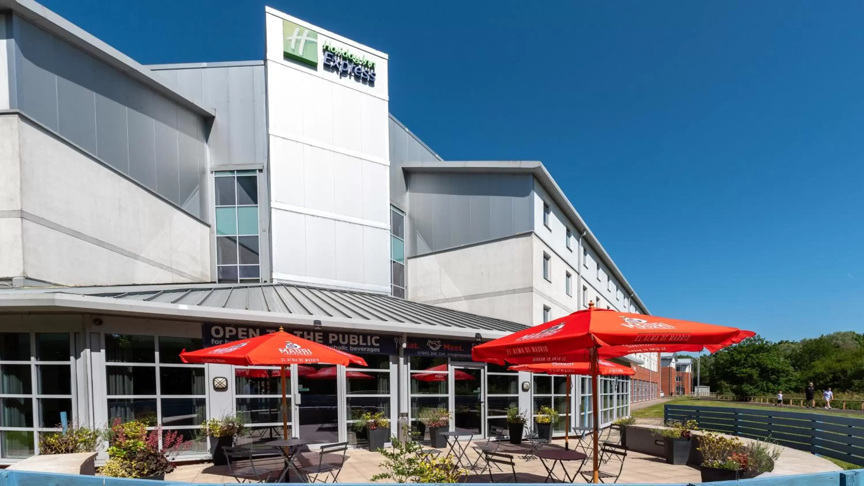 Patio, Property Building in Holiday Inn Express Leigh - Sports Village, an IHG Hotel