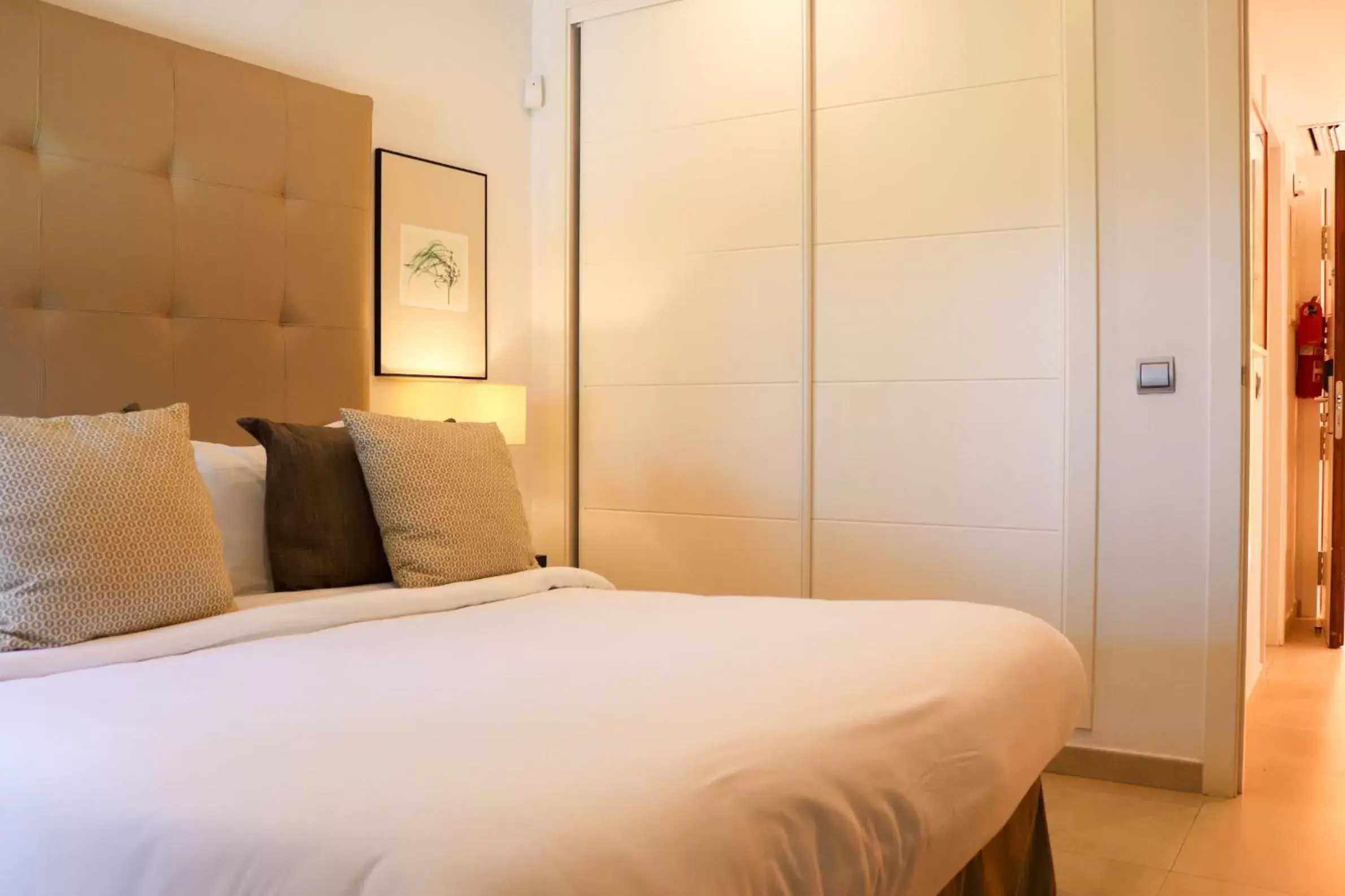 Bedroom, Bed in Ramada Hotel & Suites by Wyndham Costa del Sol