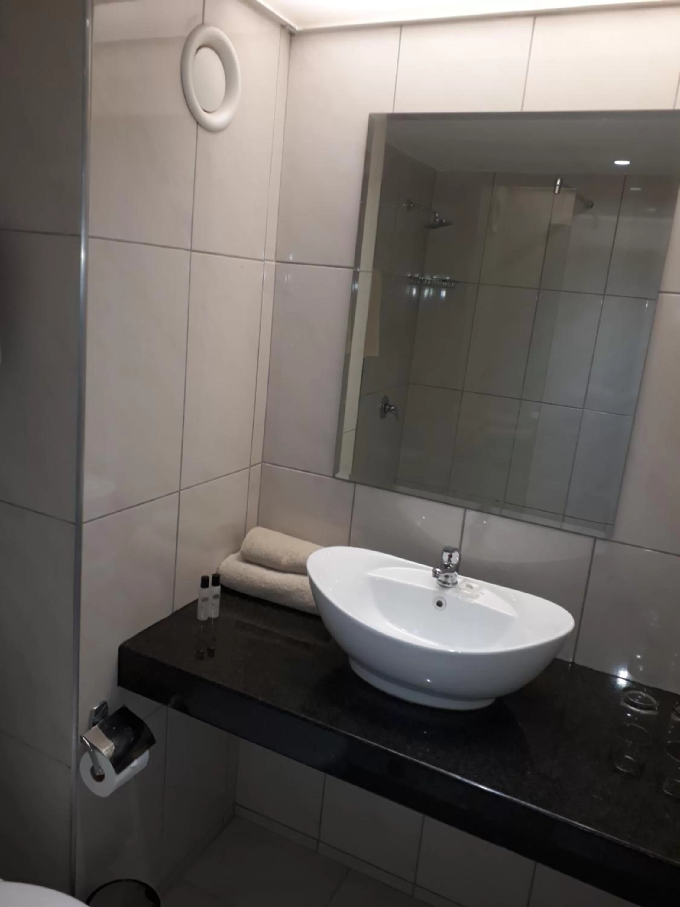 Bathroom in African Sky Hotels - Pine Lake Inn