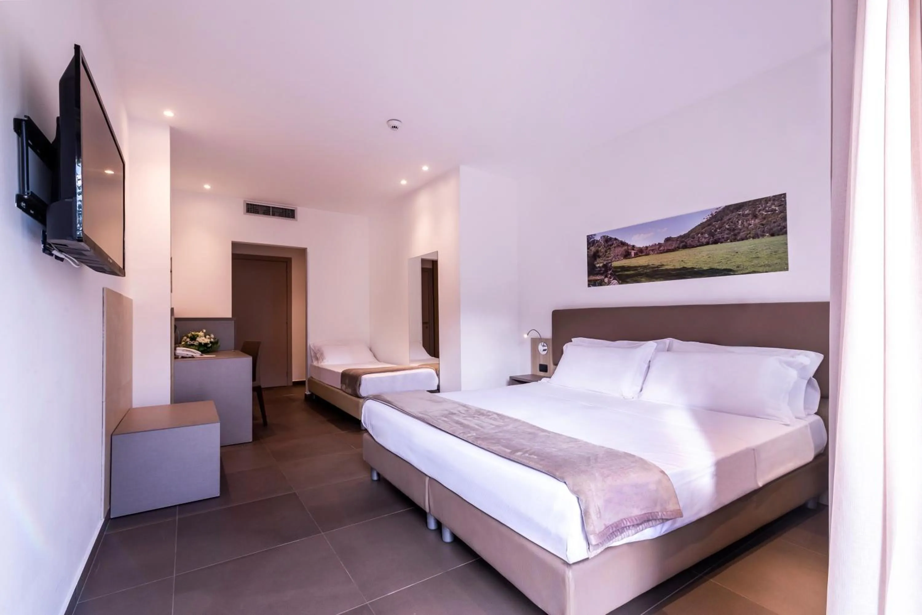 Photo of the whole room, Bed in San Giorgio Palace Hotel Ragusa Ibla