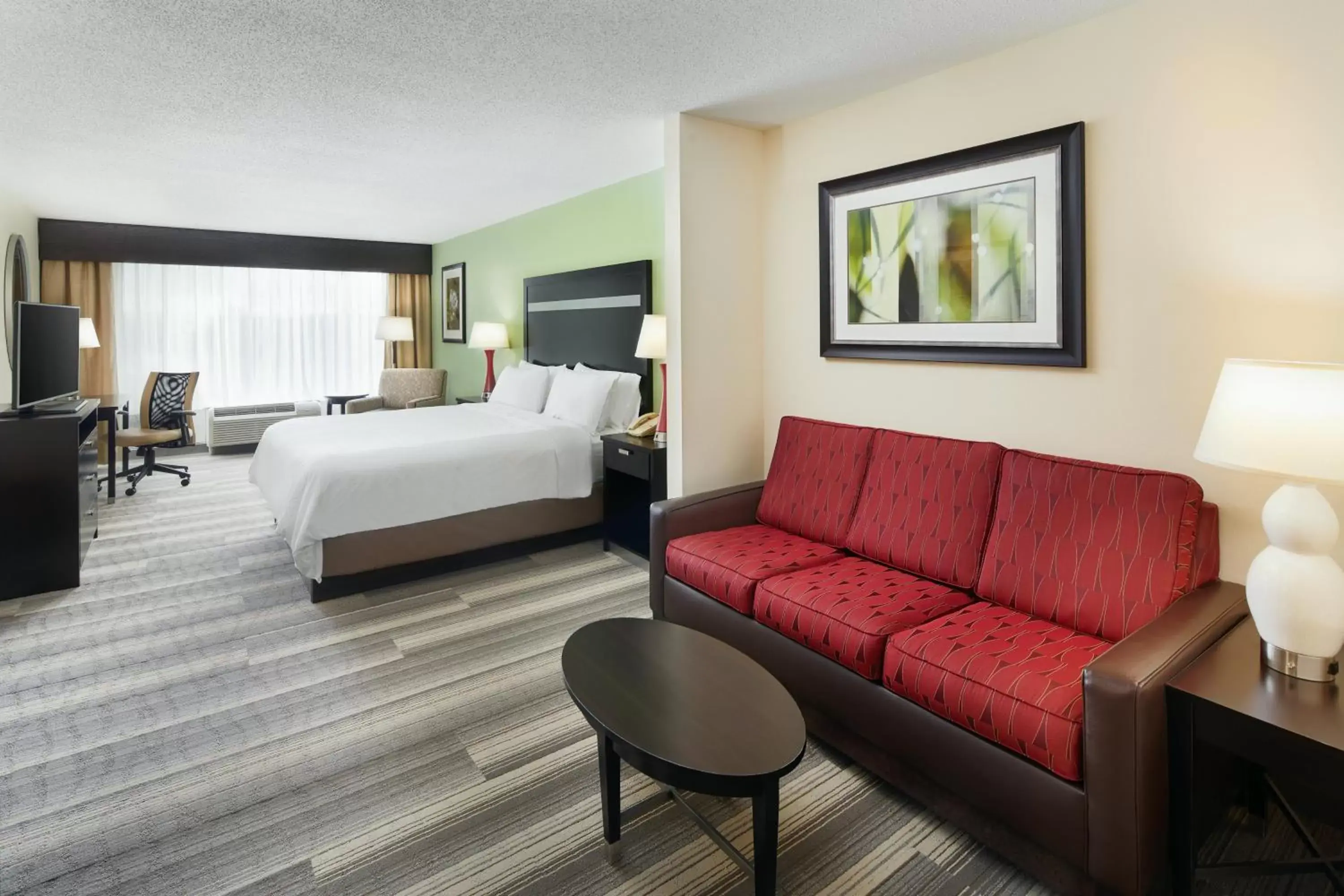 Photo of the whole room, Seating Area in Holiday Inn Express & Suites I-26 & Us 29 At Westgate Mall, an IHG Hotel