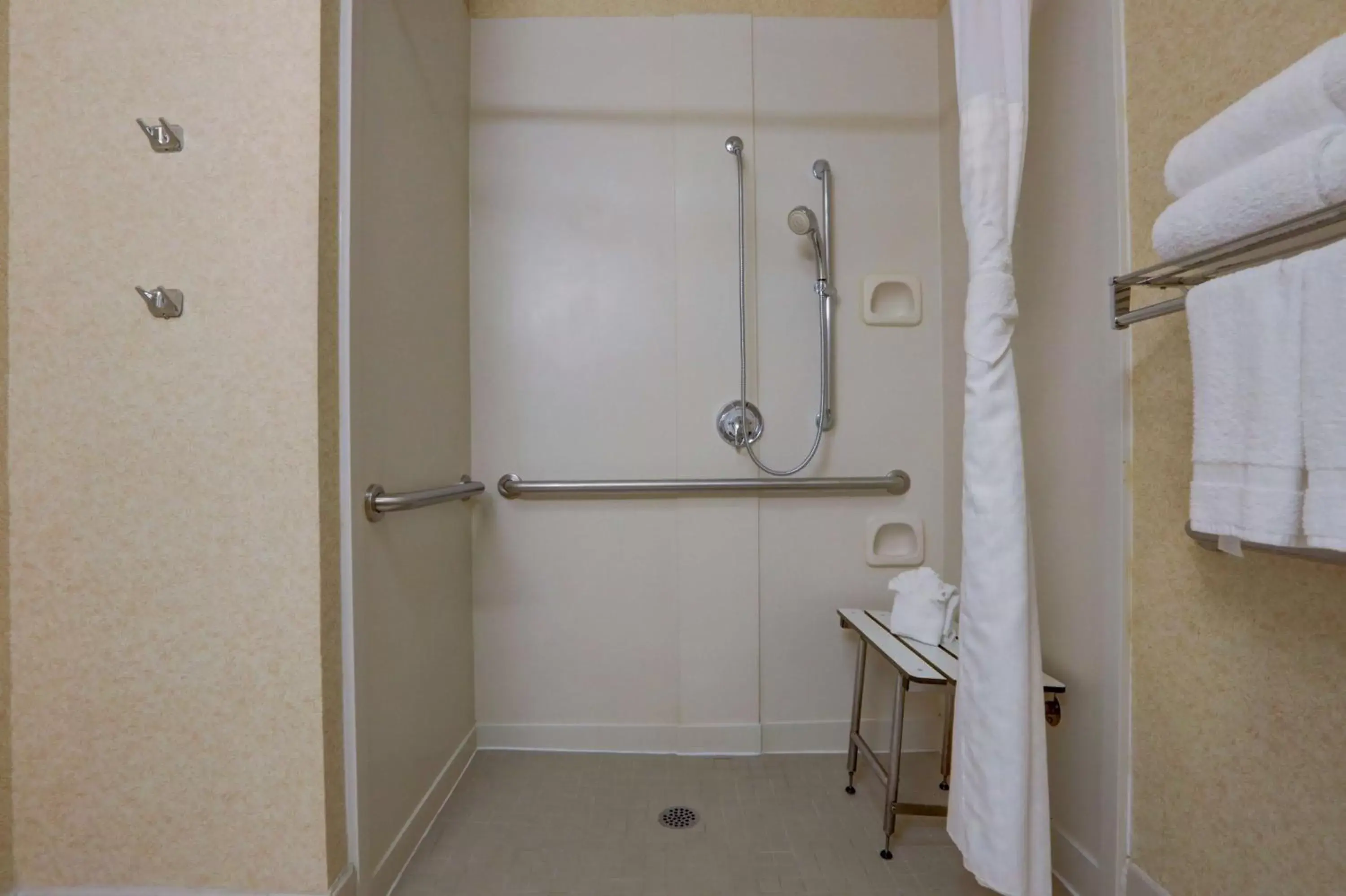 Bathroom in SureStay Plus Hotel by Best Western Chicago Lombard