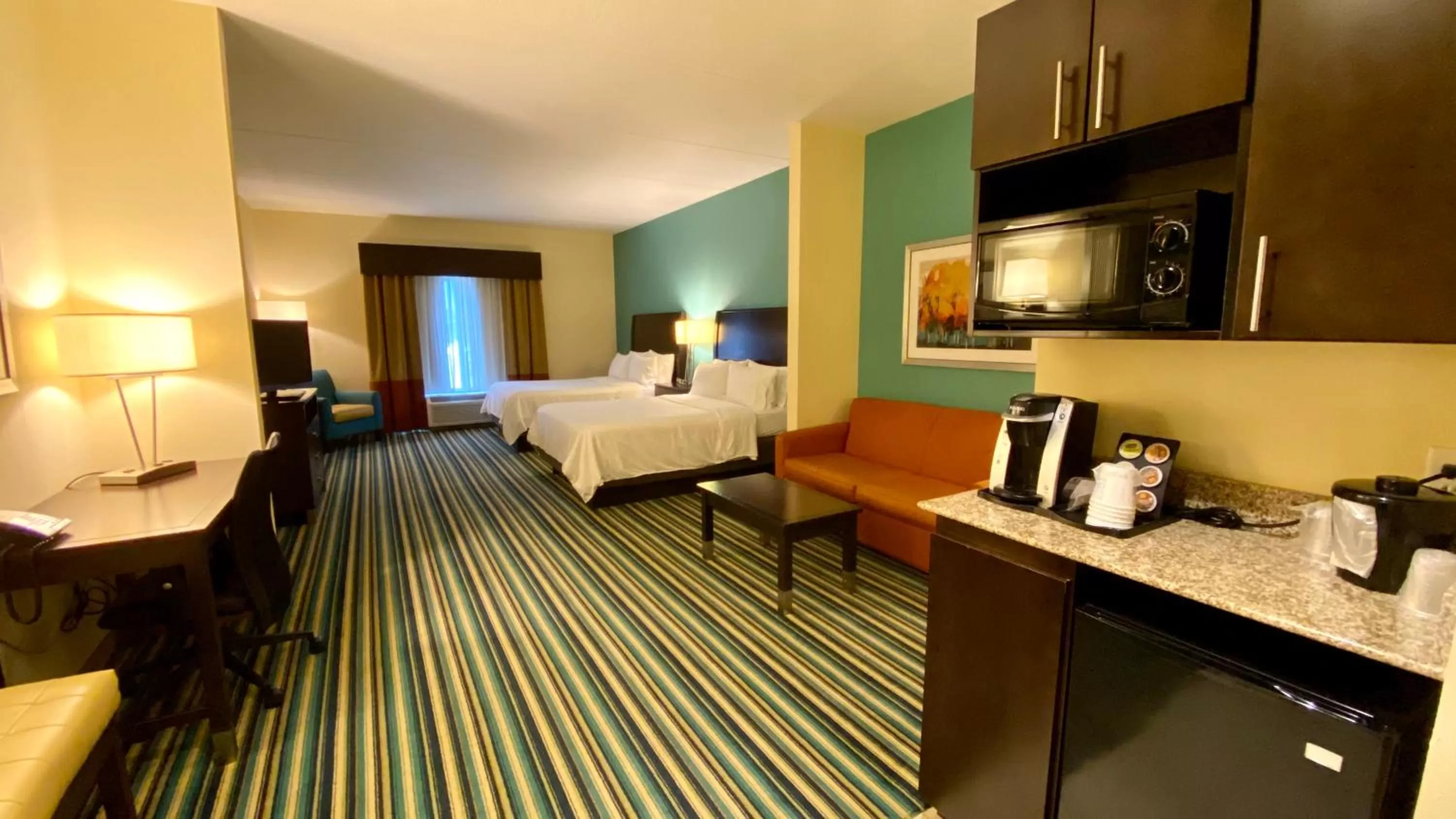 Bedroom, Bed in Holiday Inn Express Hotel & Suites Orlando East-UCF Area by IHG