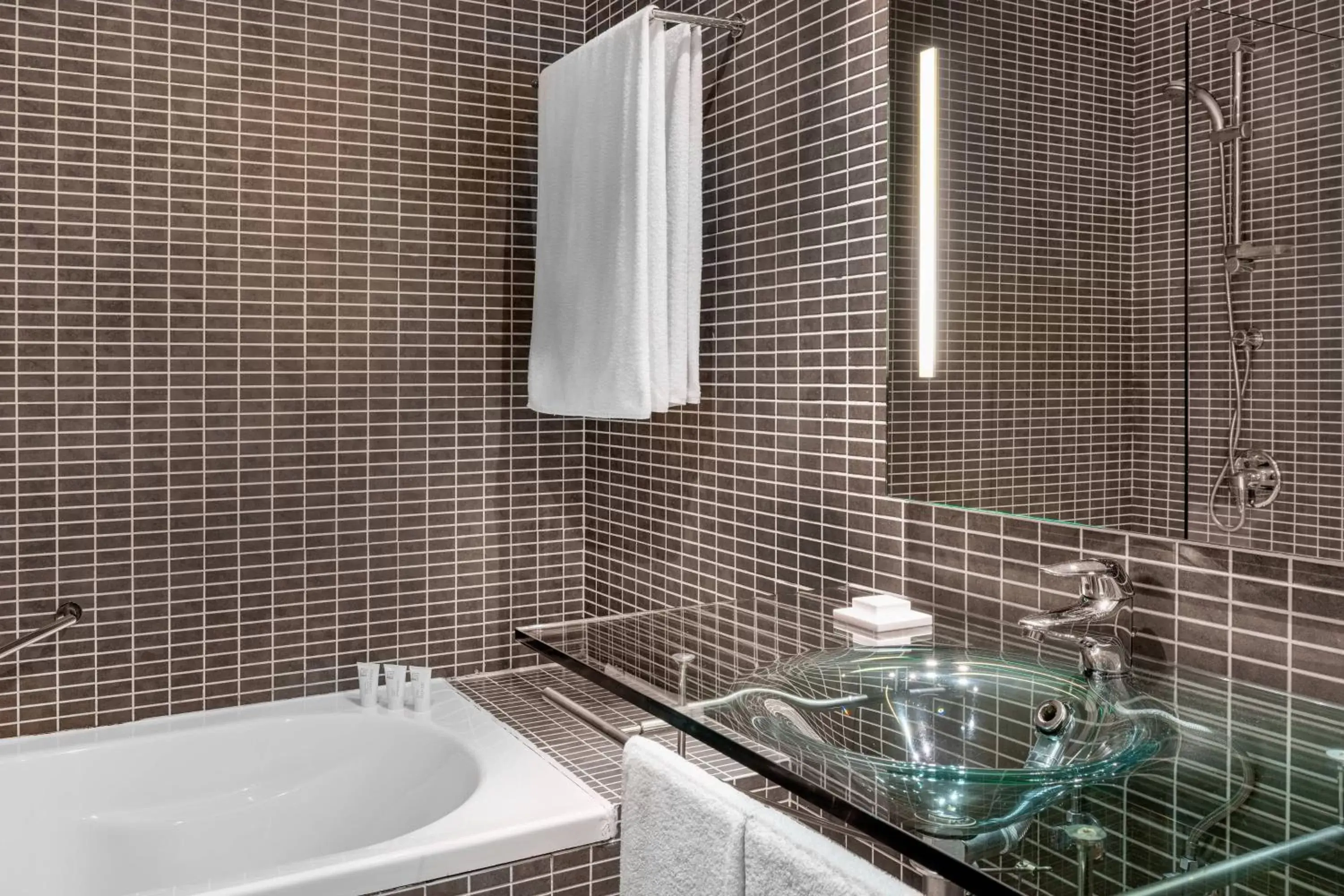 Bathroom in AC Hotel Madrid Feria by Marriott