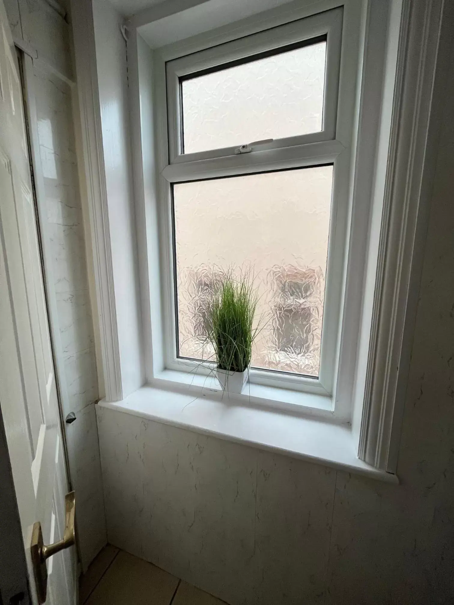 Bathroom, View in New Derina Hotel