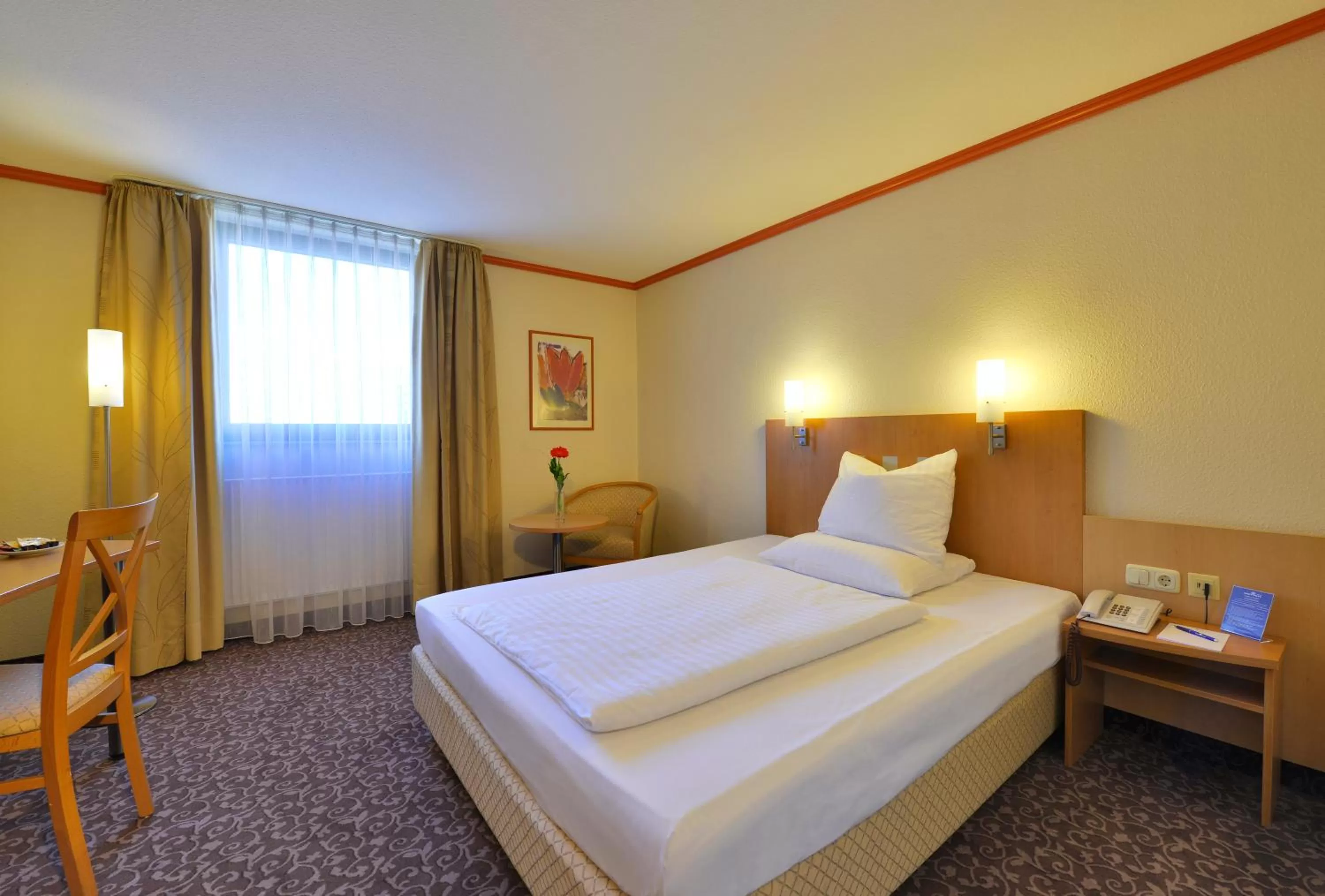 Bed in PLAZA INN Leonberg