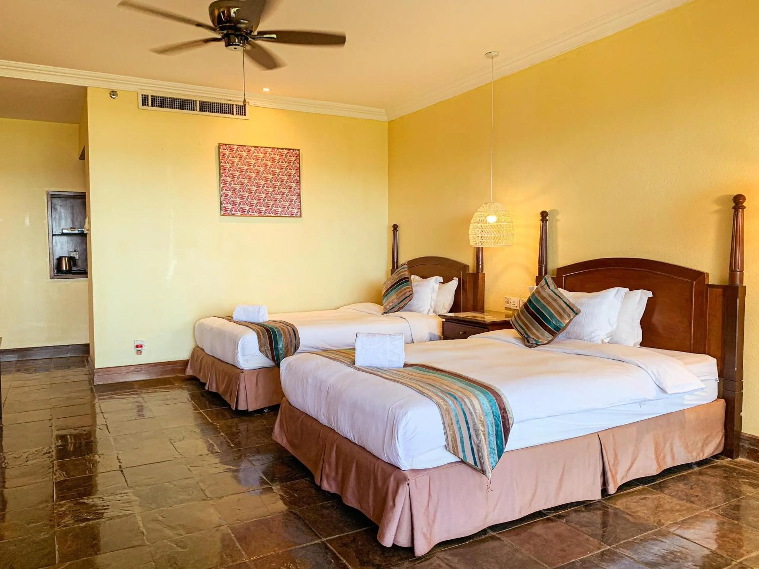 Bed in Palm Beach Resort & SPA