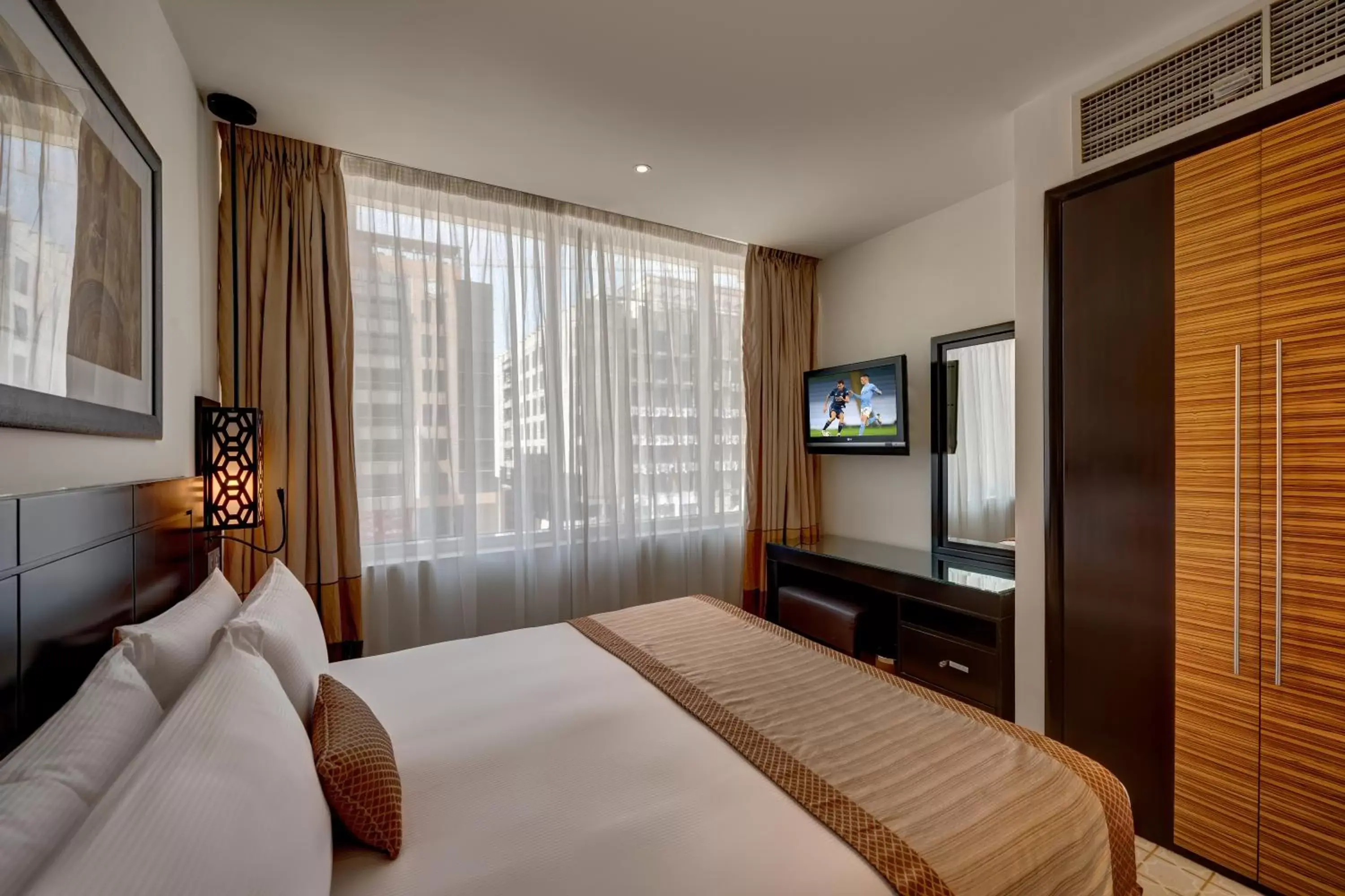 Bedroom, Bed in Holiday Inn Dubai Al Barsha, an IHG Hotel