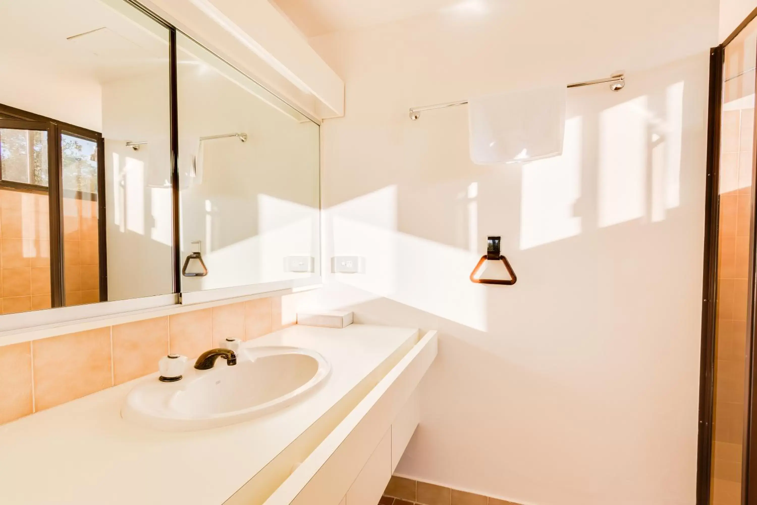 Bathroom in Pacific Towers Beach Resort