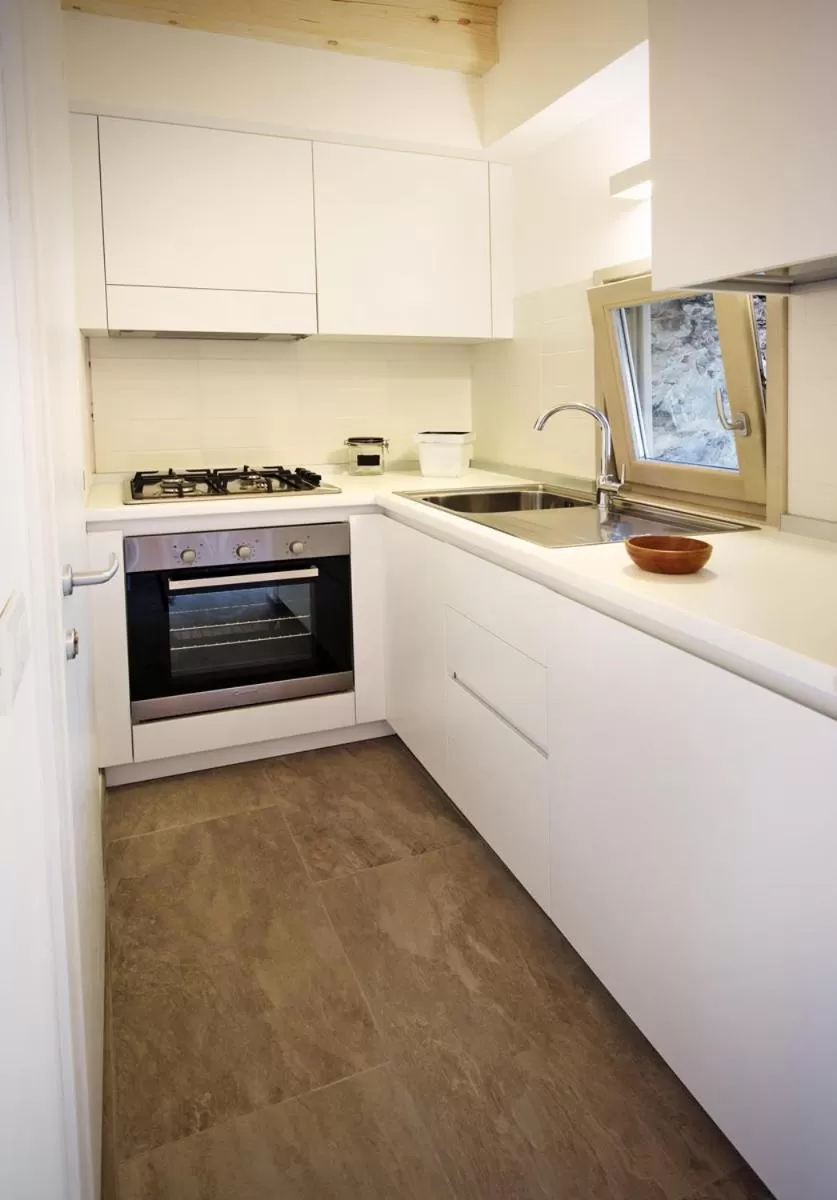 Kitchen or kitchenette in Albergo Diffuso Tolmezzo