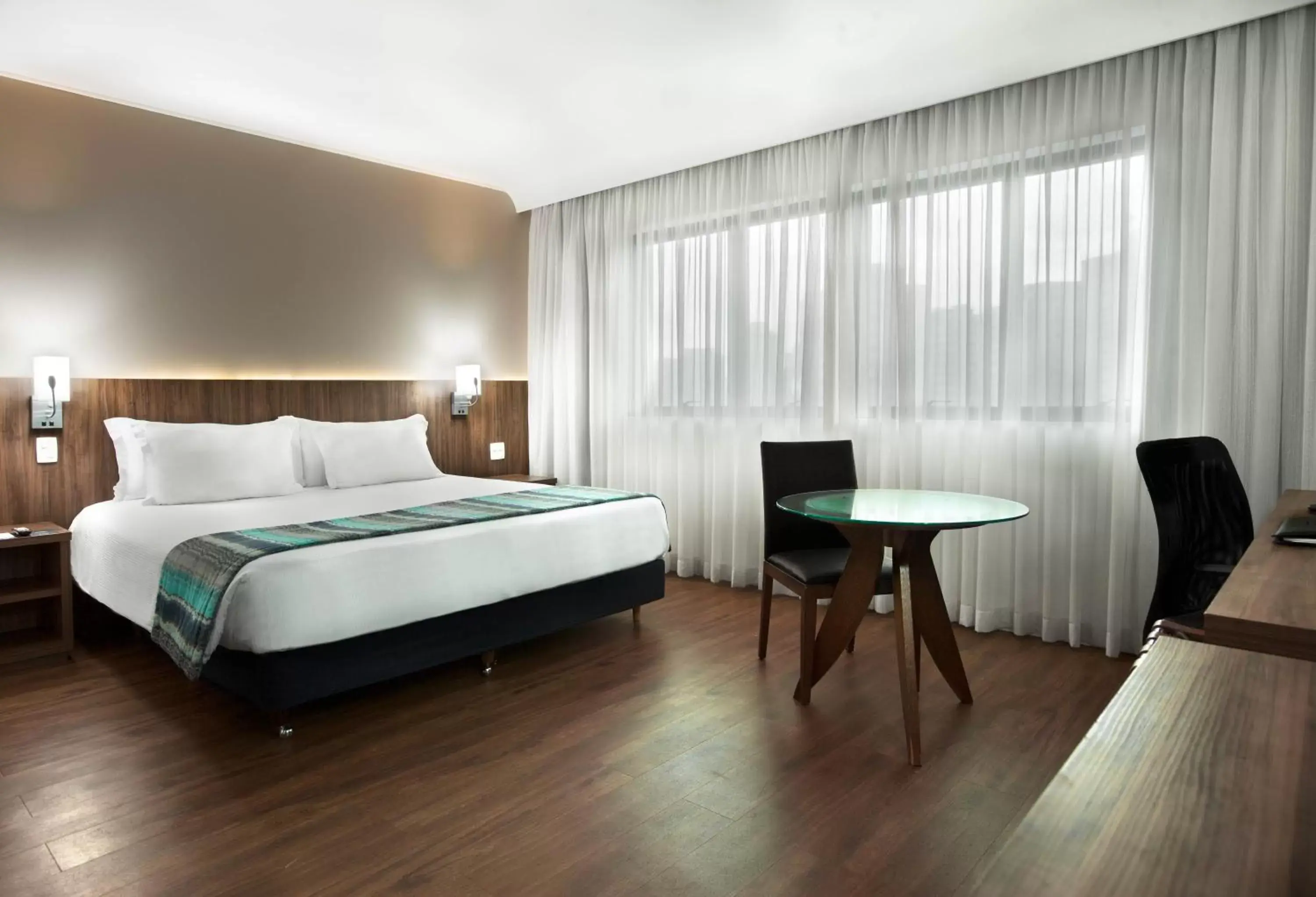 Photo of the whole room, Bed in Meliá Ibirapuera
