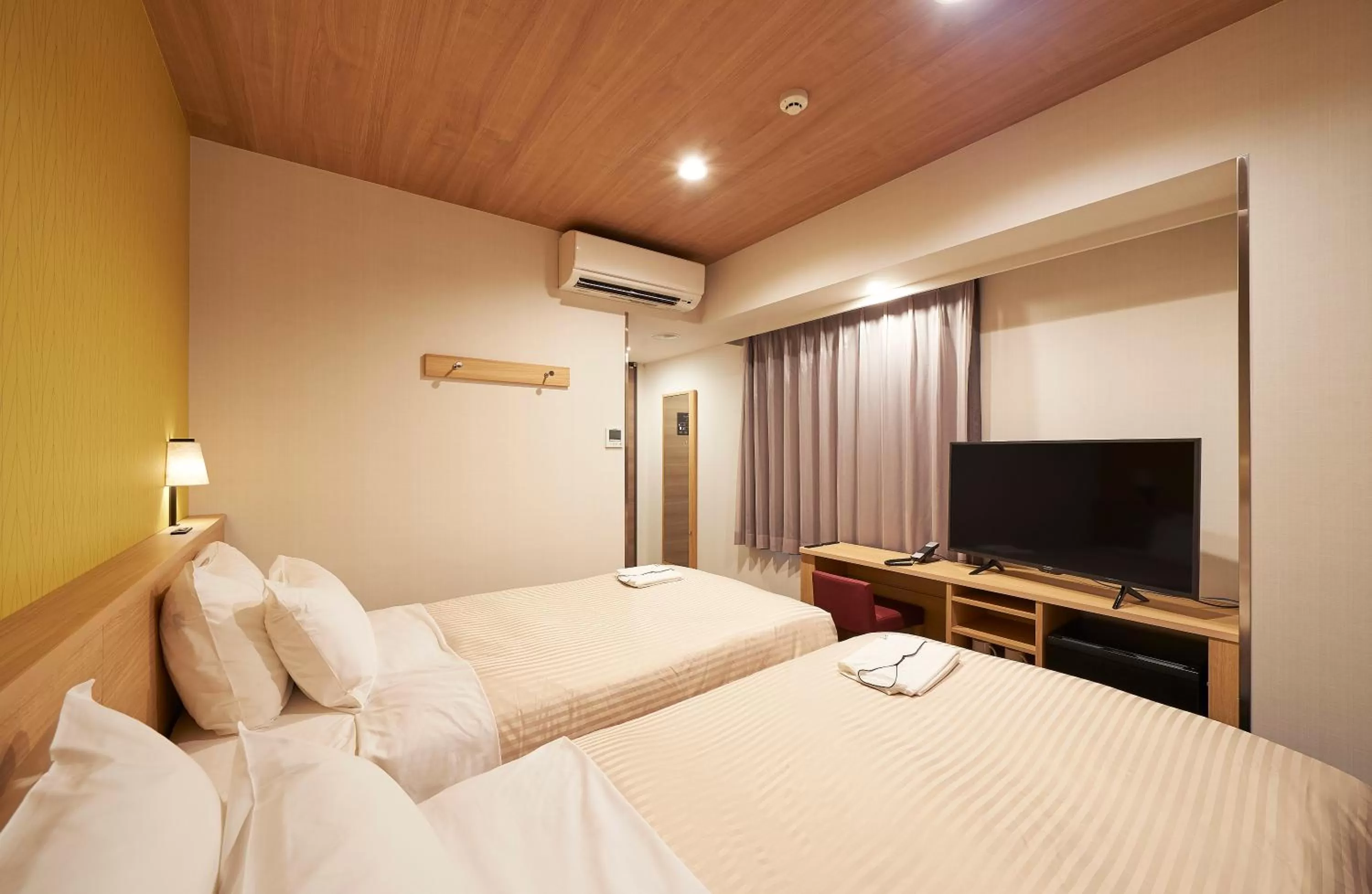 Photo of the whole room, Bed in Sotetsu Fresa Inn Tokyo Tamachi