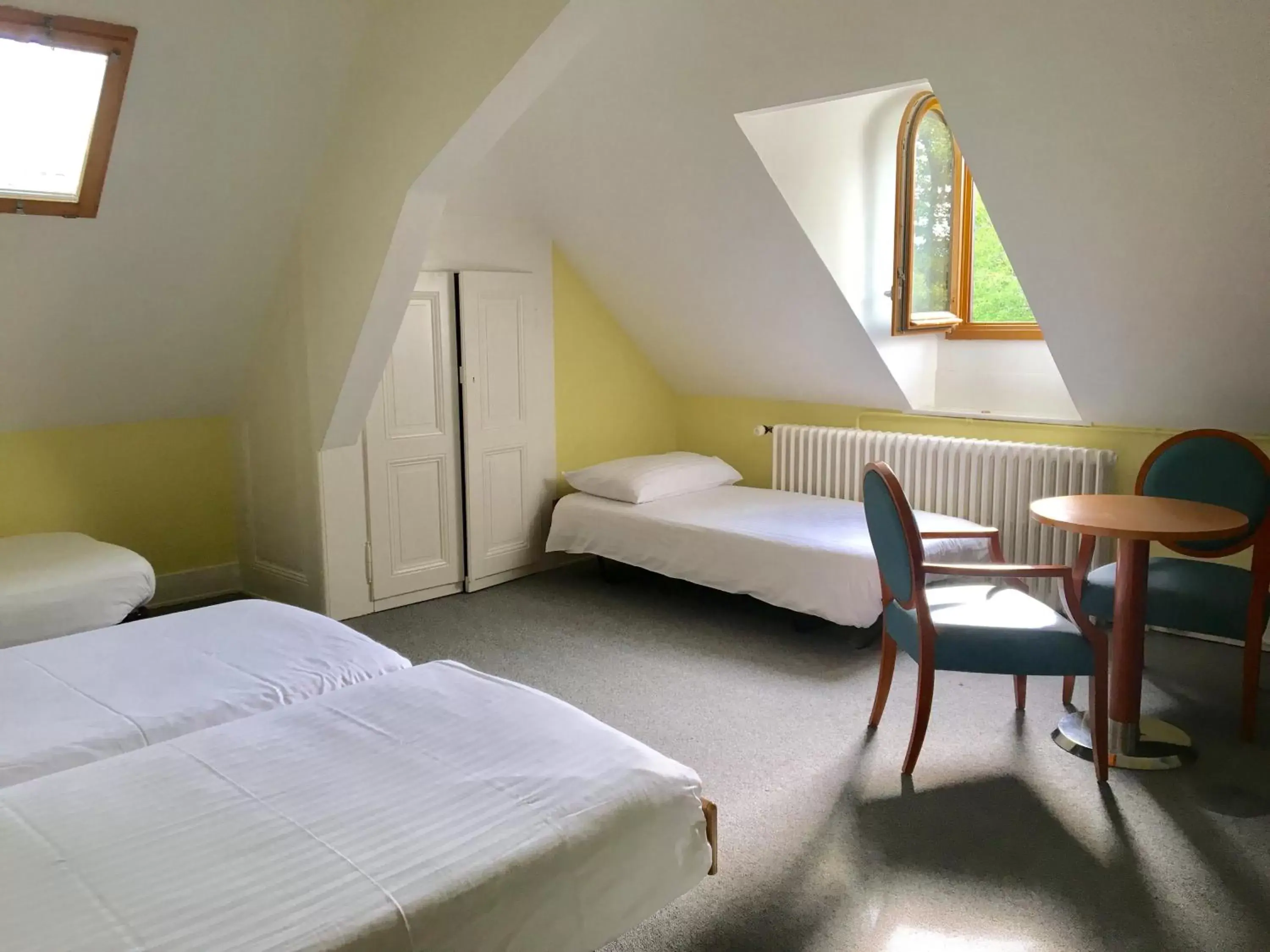 Triple Room with Shared Bathroom and Park View in Le Cénacle Triple Room with Shared Bathroom and Park View in Le Cénacle