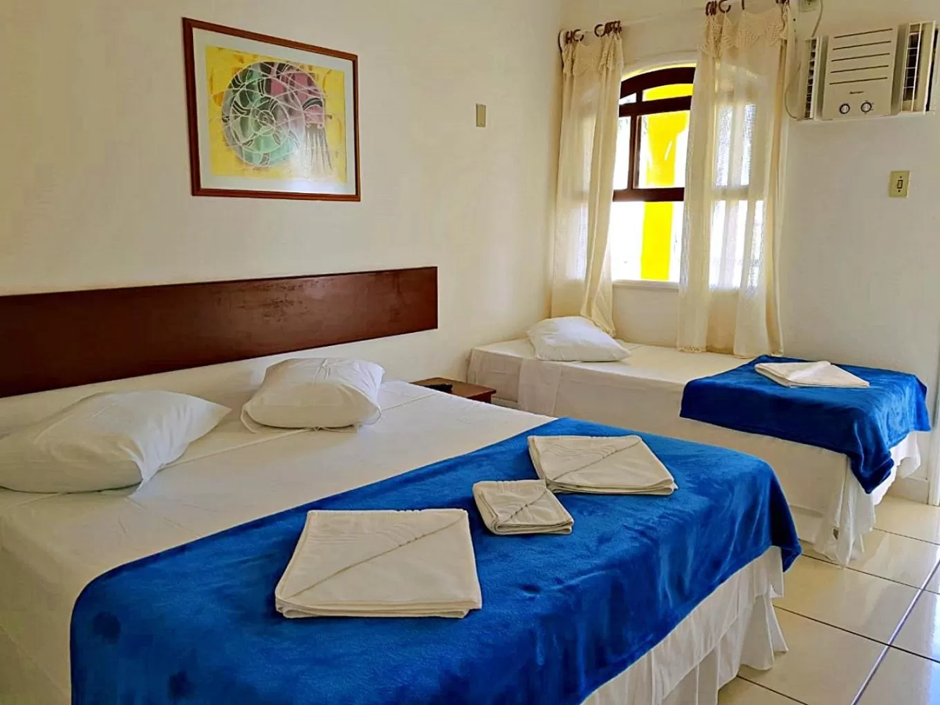 Bed in Pousada Estrela de Paraty