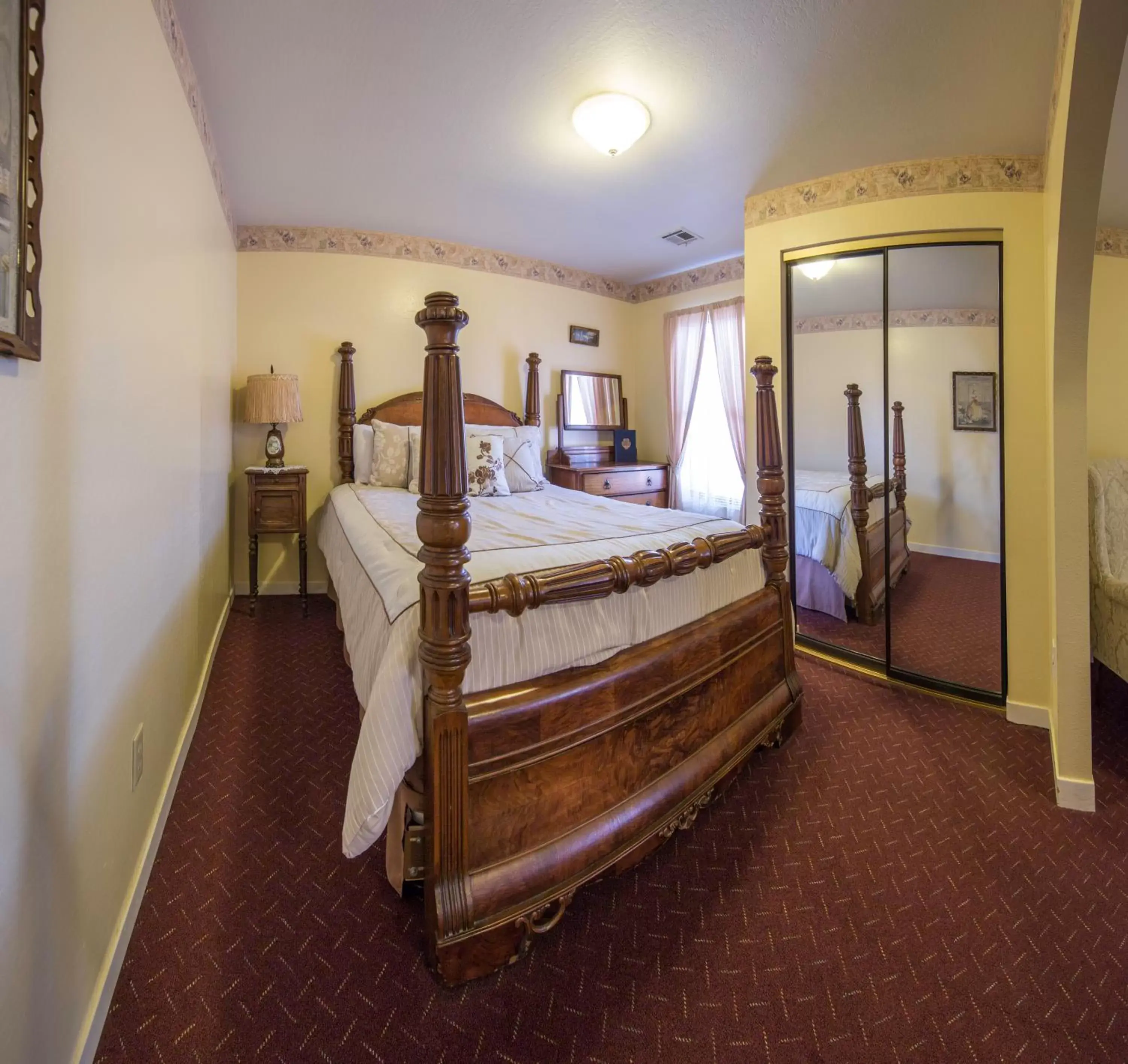 Bed in Historic Cary House Hotel