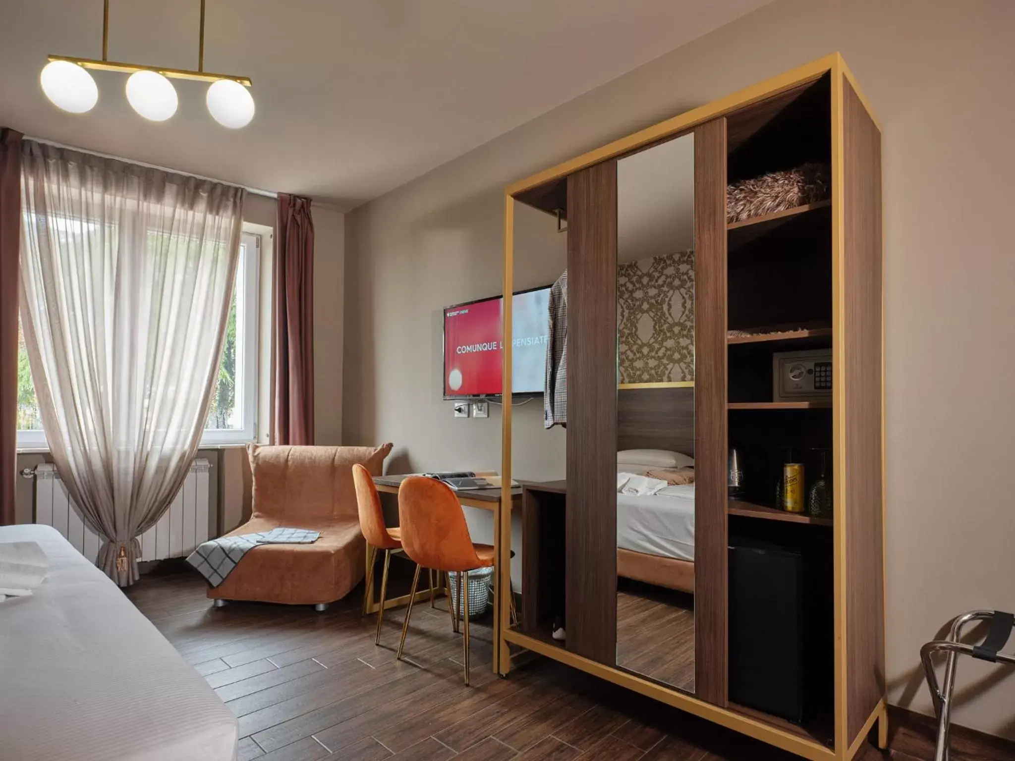 TV and multimedia, Seating Area in Hotel Giulietta