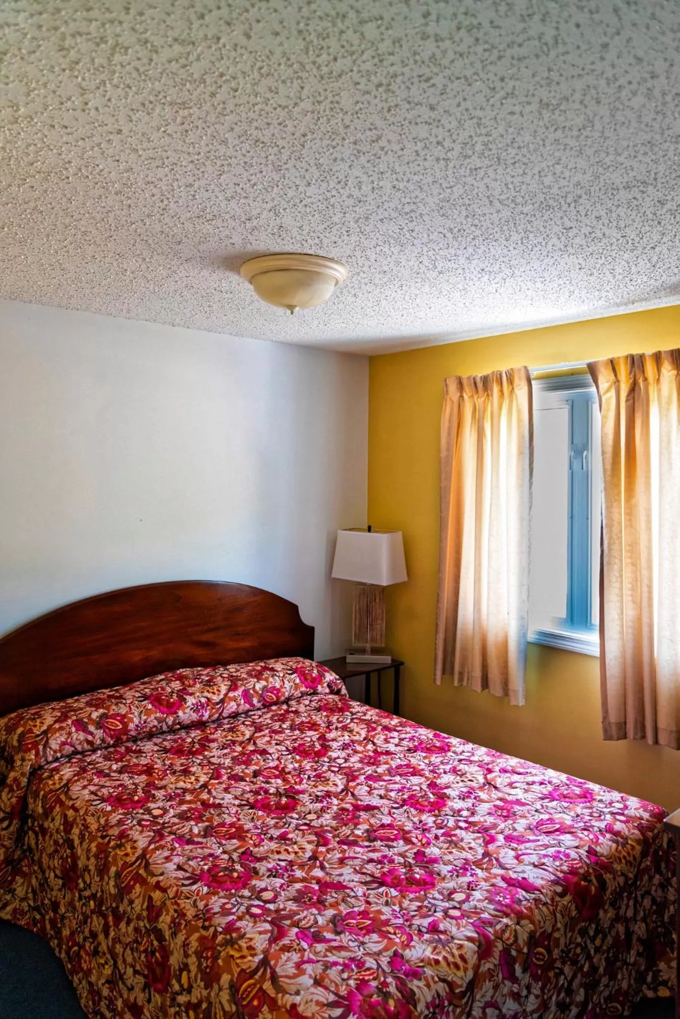 Bed in Parker's Motel