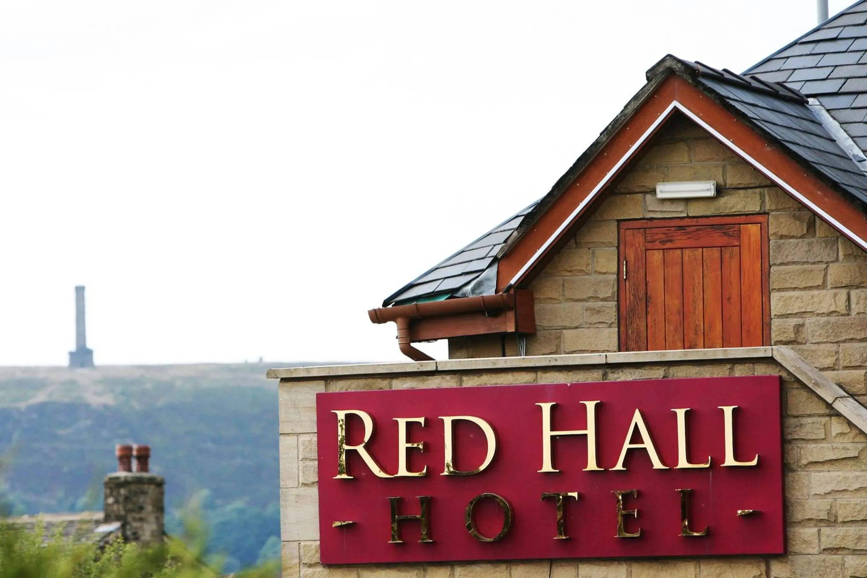 Property logo or sign in Red Hall Hotel